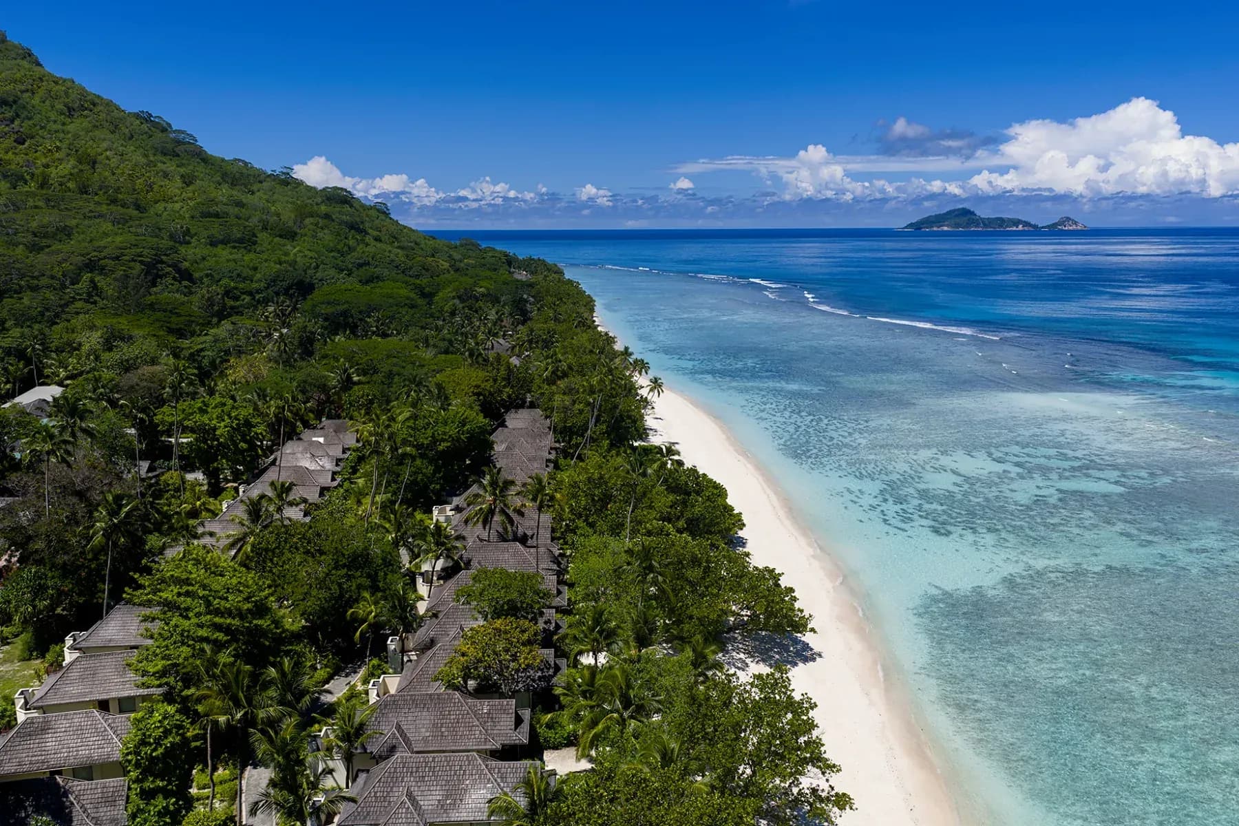 Aerial view of Niva Labriz Seychelles resort along the beach and rainforest, Silhouette Island