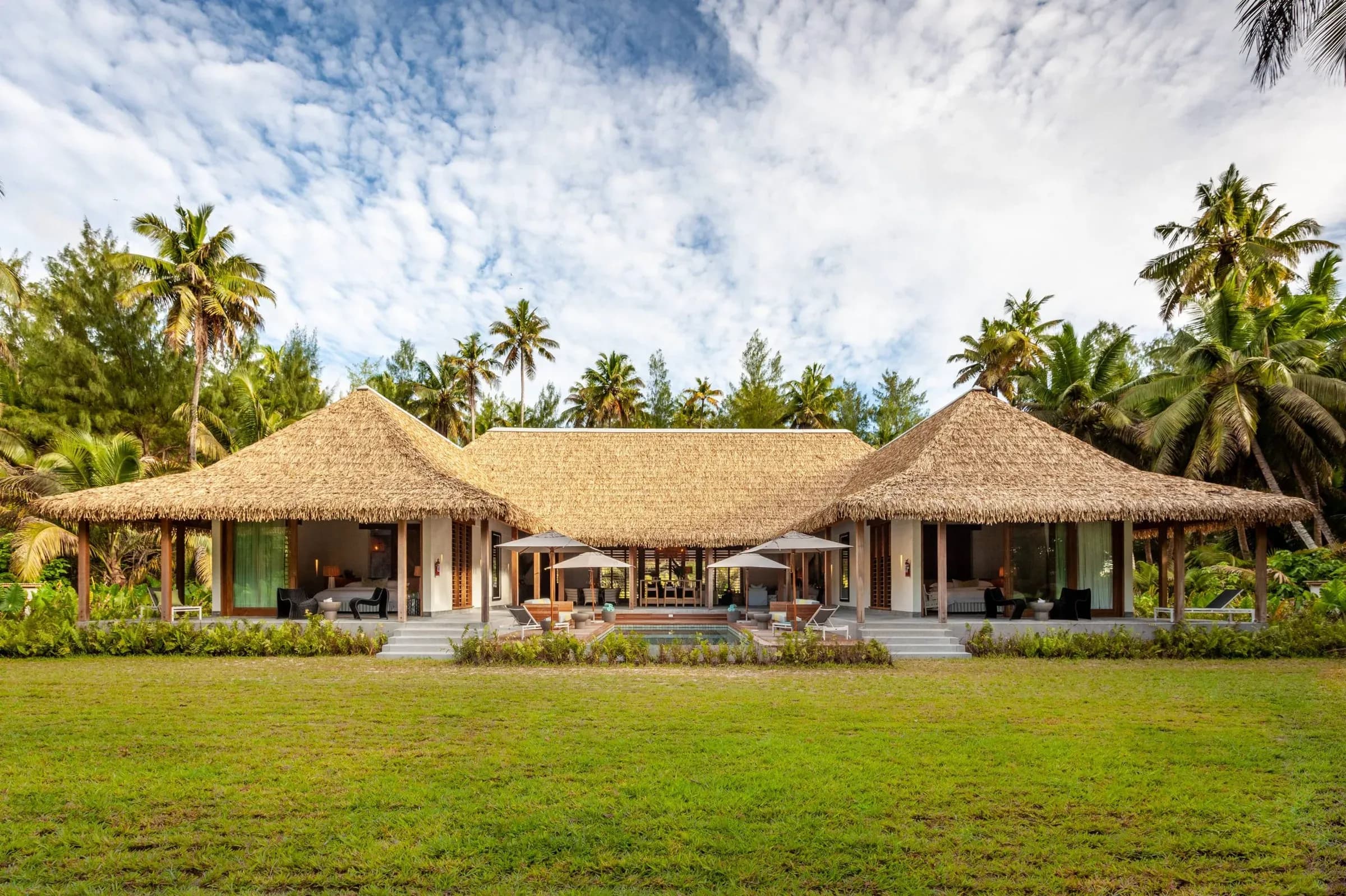 Beach villa deck overlooking the lagoon at Alphonse Island Lodge, Seychelles
