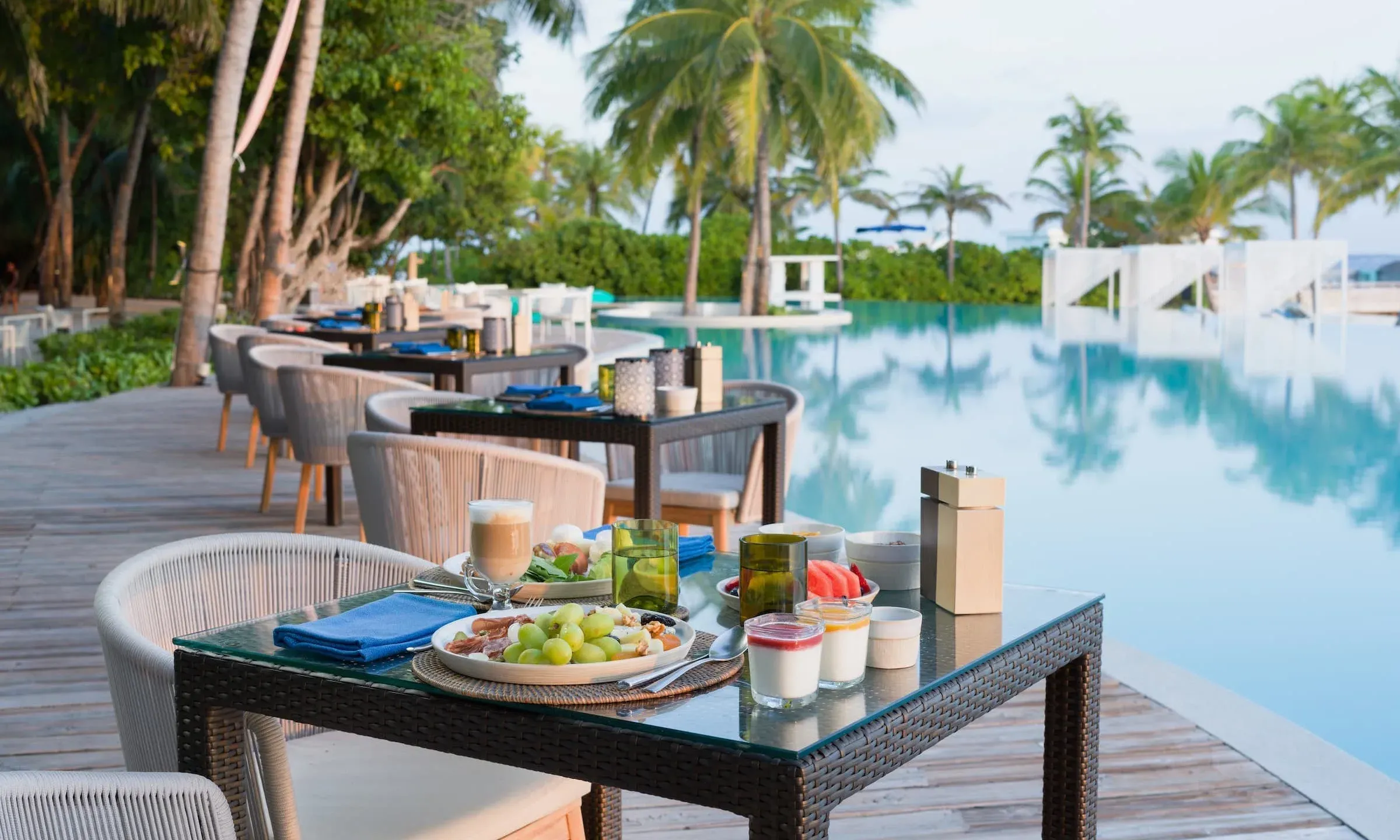 Barolo poolside dining terrace at Amilla Maldives