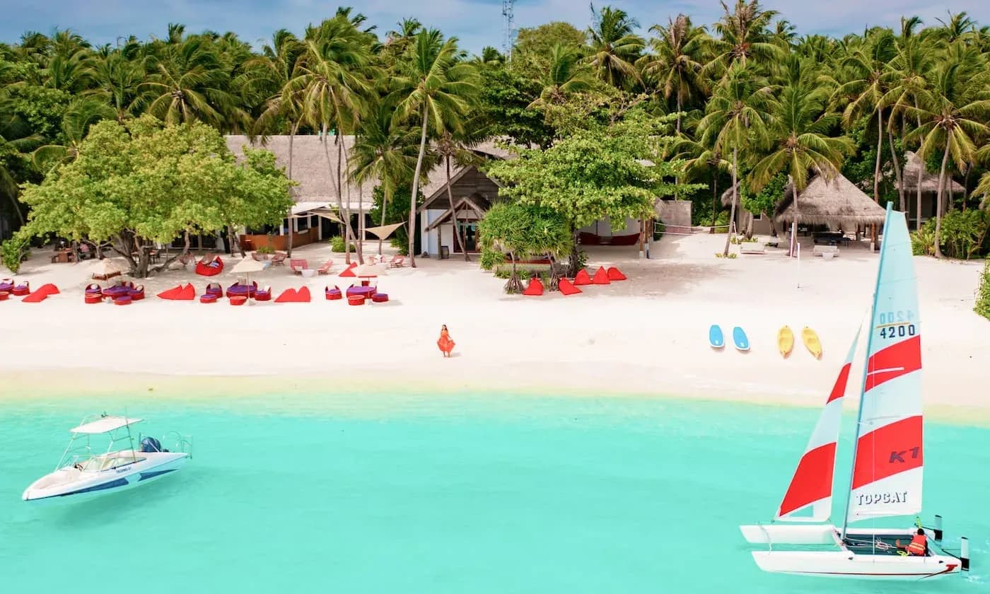 The Emperor Beach Club beachside dining area at Amilla Maldives