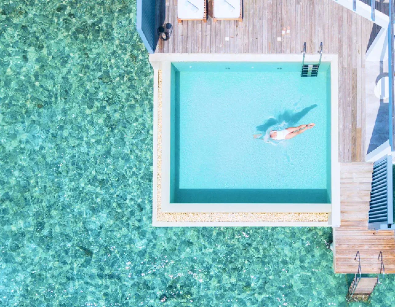 Overwater pool deck of a Lagoon Water Pool Villa at Amilla Maldives