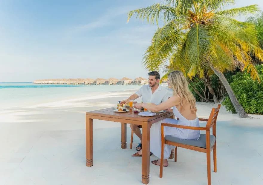 Beachfront dining at Plates restaurant, Anantara Kihavah Maldives Villas
