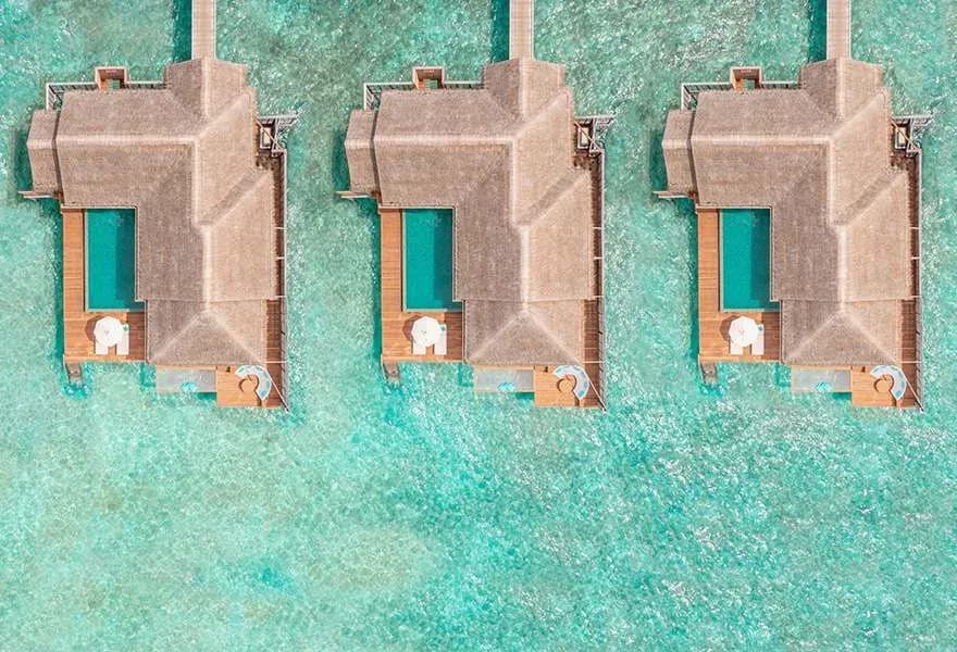 Aerial view of One Bedroom Family Over Water Pool Villas at Anantara Kihavah Maldives Villas