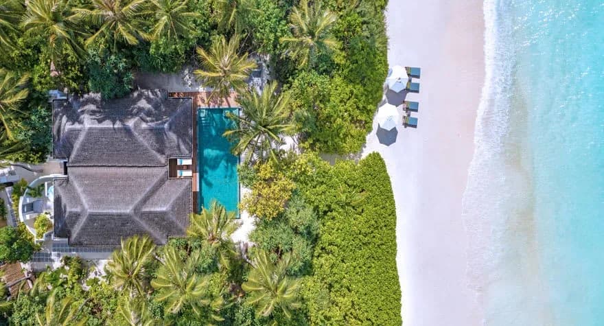 Aerial view of a Two Bedroom Family Beach Pool Villa at Anantara Kihavah Maldives Villas