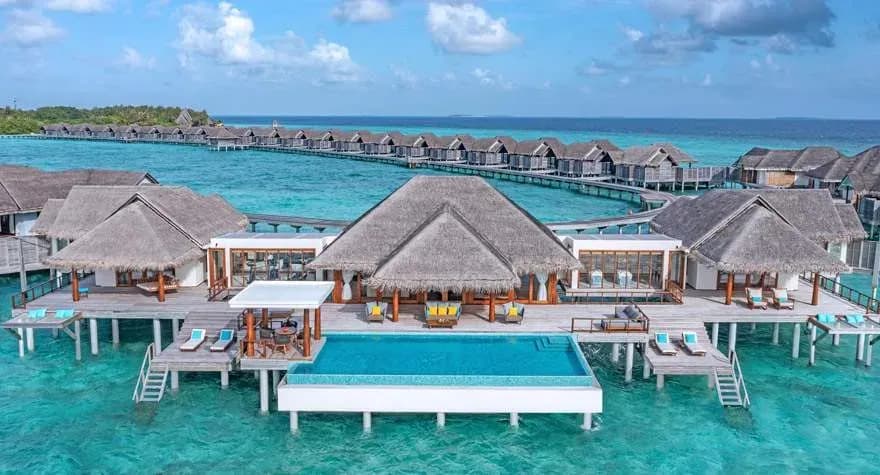 Aerial view of the Two Bedroom Sunset Over Water Pool Residence at Anantara Kihavah Maldives Villas