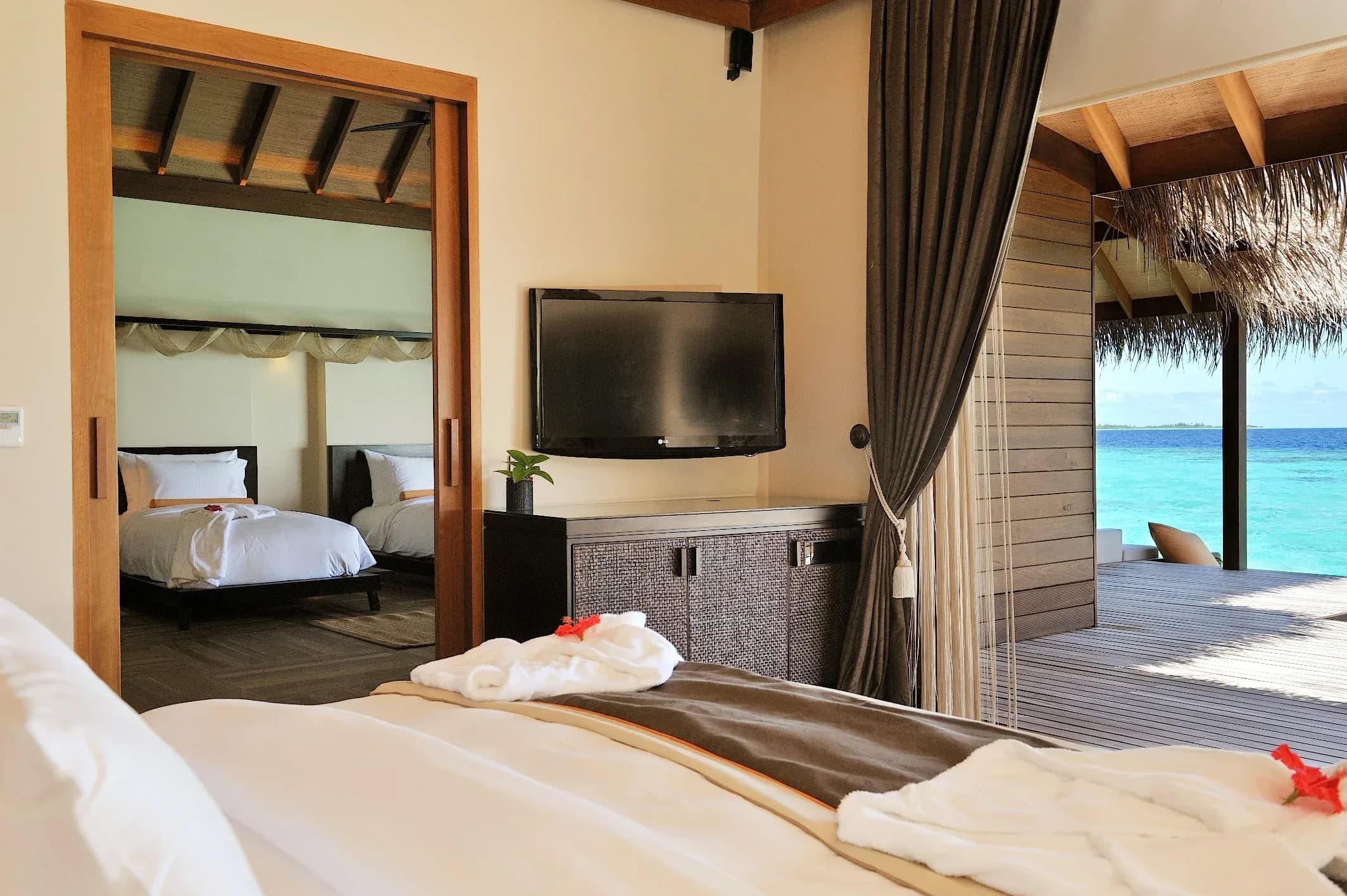 Sunset Family Ocean Suite with Pool bedroom at Ayada Maldives