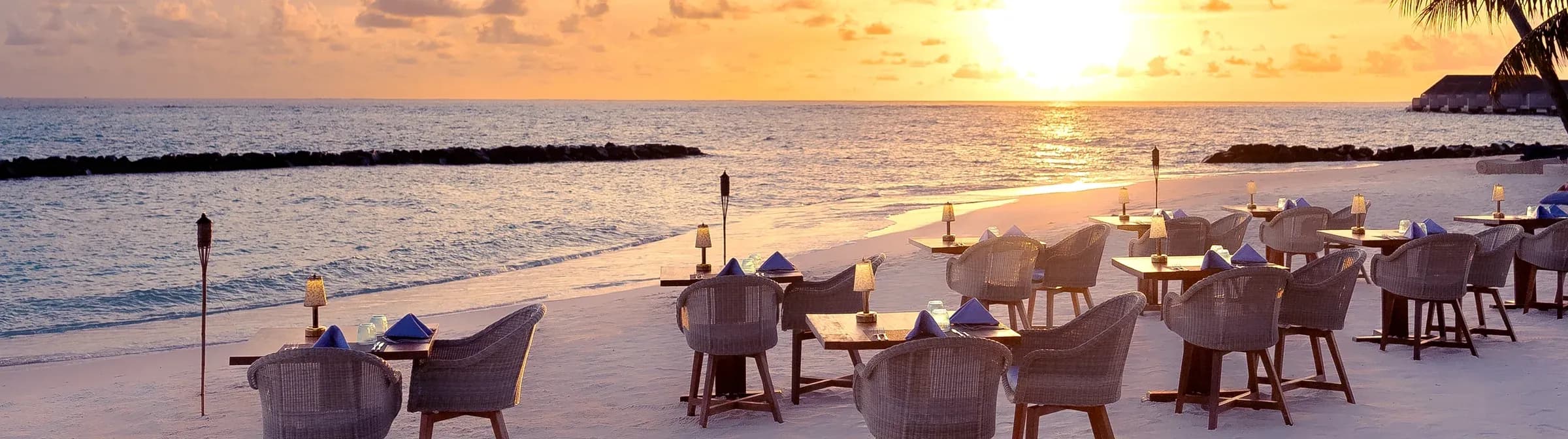 Fuego open-air grill restaurant at sunset, Baglioni Resort Maldives