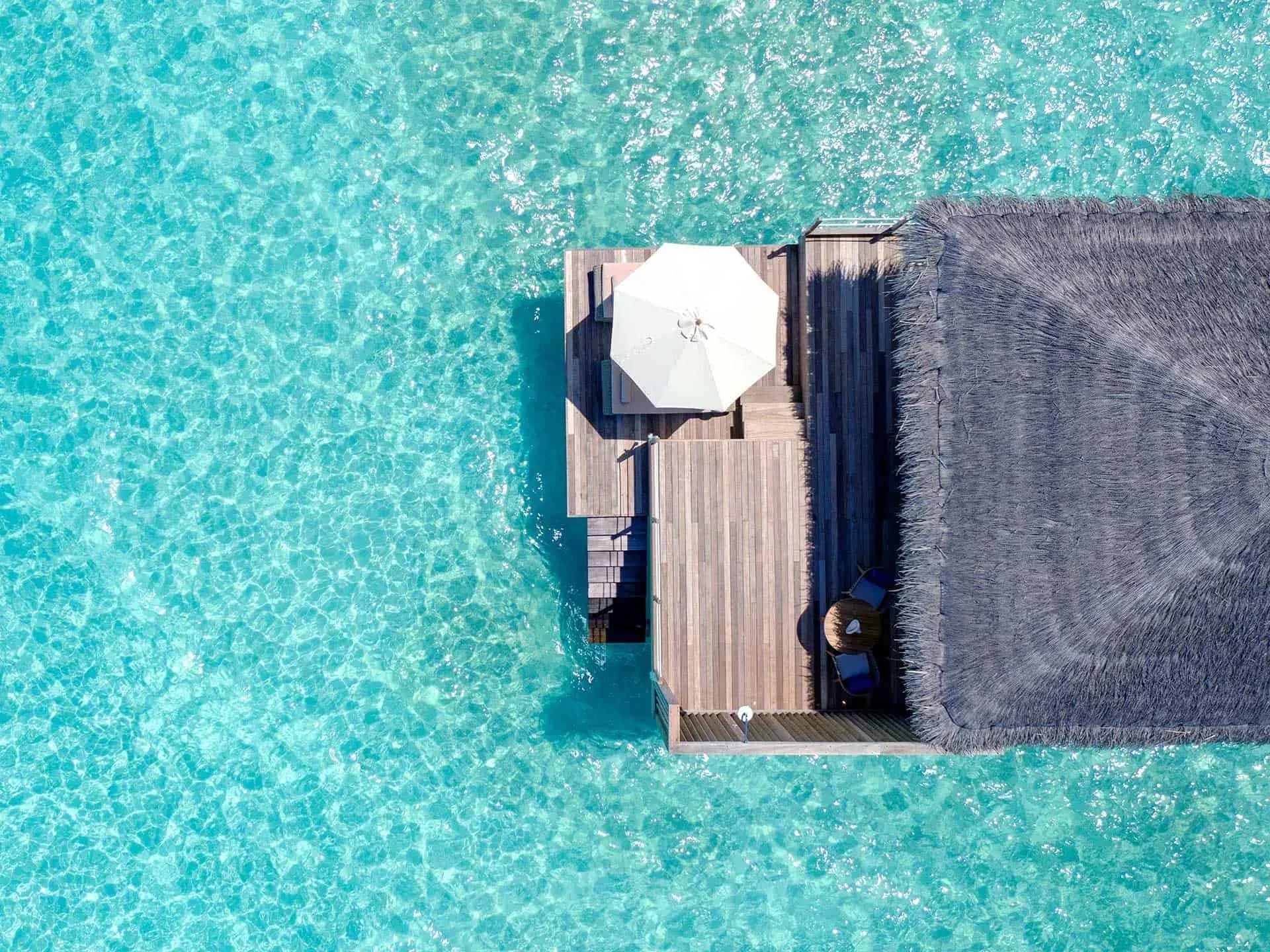 Aerial view of Water Villas over the lagoon at Baglioni Resort Maldives