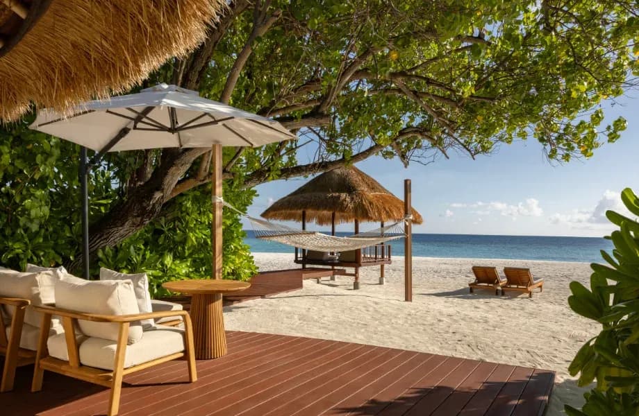 Beachfront Pool Villa exterior with direct beach access at Banyan Tree Vabbinfaru