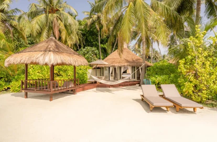 Beachfront Sunset View Pool Villa exterior at Banyan Tree Vabbinfaru