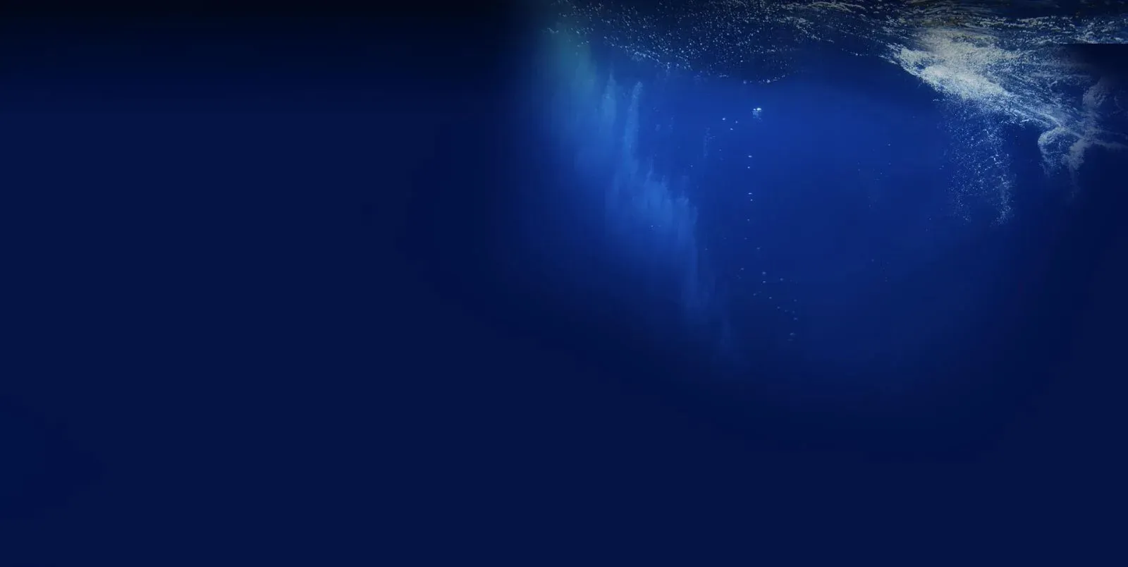Diver over the reef with Rising Sun Dive Centre, Baraza Resort & Spa Zanzibar
