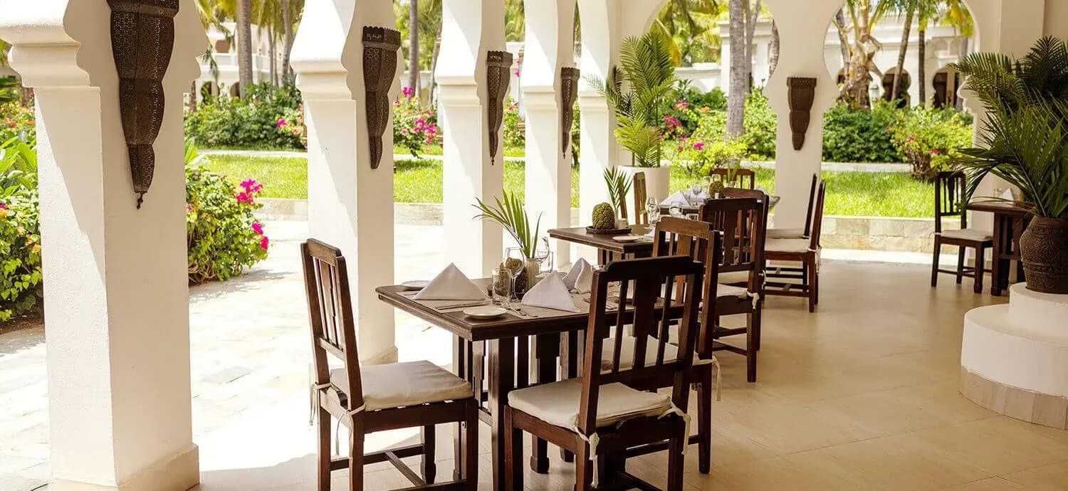 Poolside dining area at Ocean Lounge, Baraza Resort & Spa Zanzibar