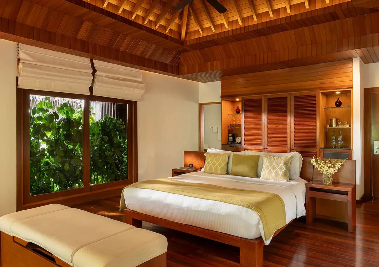 Interior of a Baros Villa with warm timber furnishings
