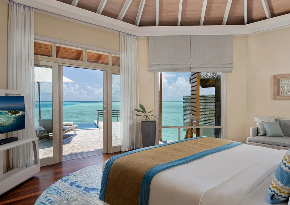 Overwater Water Pool Villa deck with plunge pool at Baros Maldives