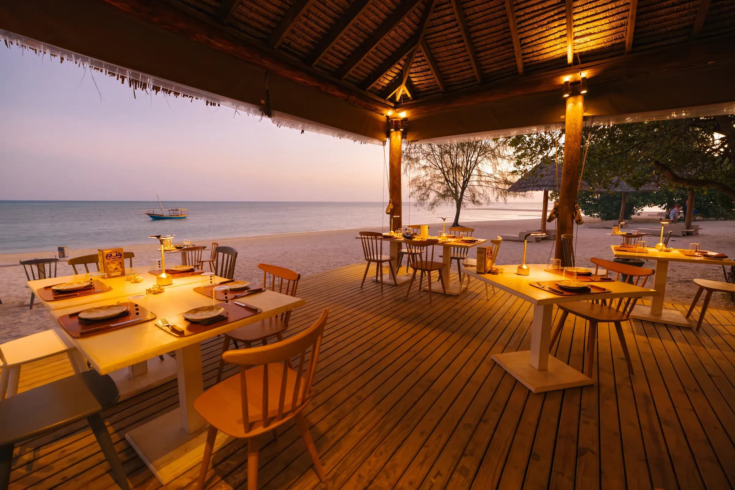 Sinfonia Italian restaurant deck at sunset, Bawe Island