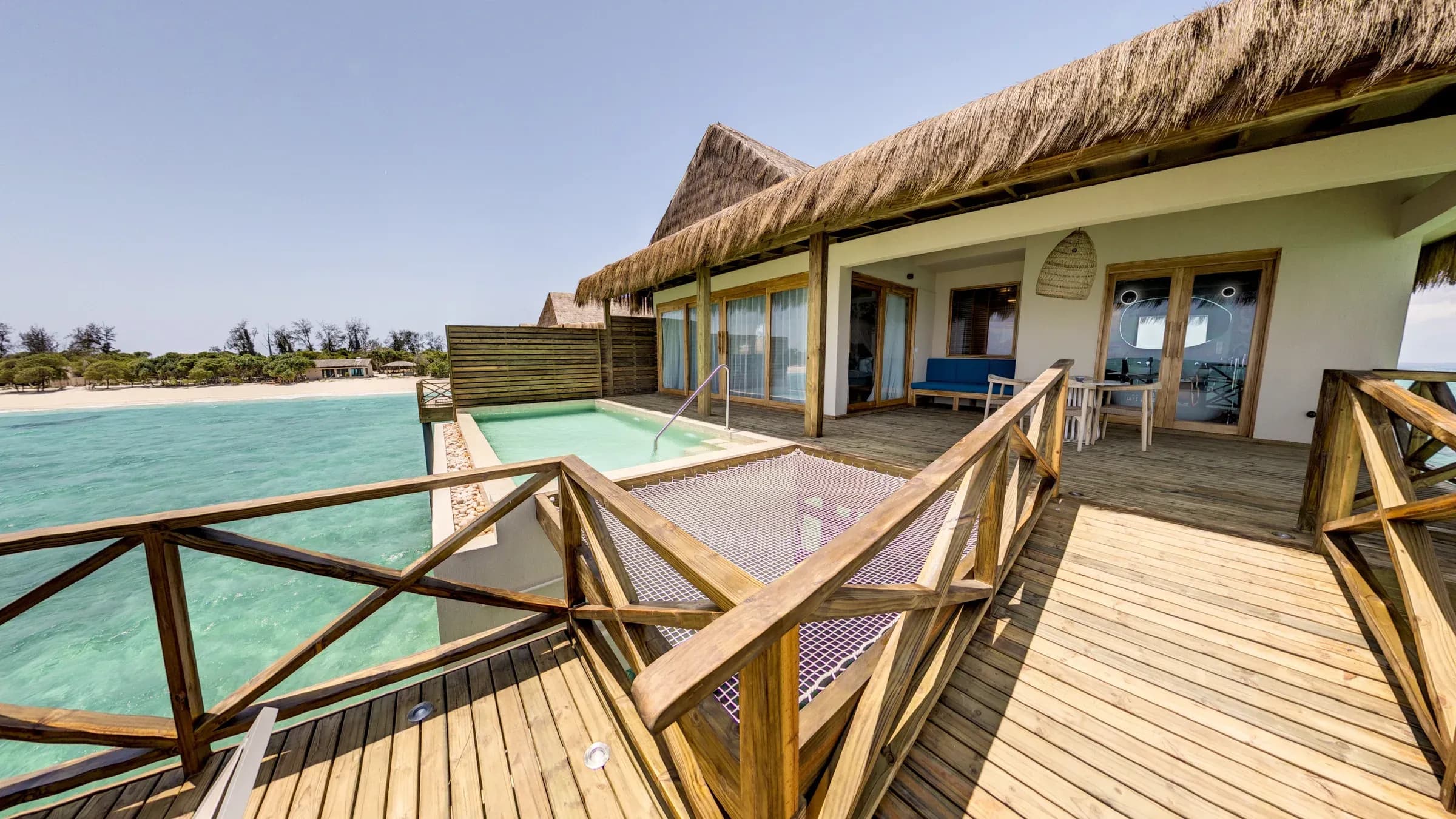 Overwater deck and private pool of a Lagoon Suite With Pool at Bawe Island