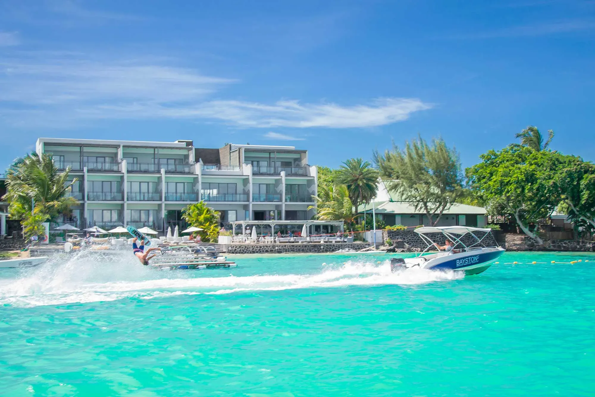 Wakeboarding off the private beach at Baystone Boutique Hotel & Spa