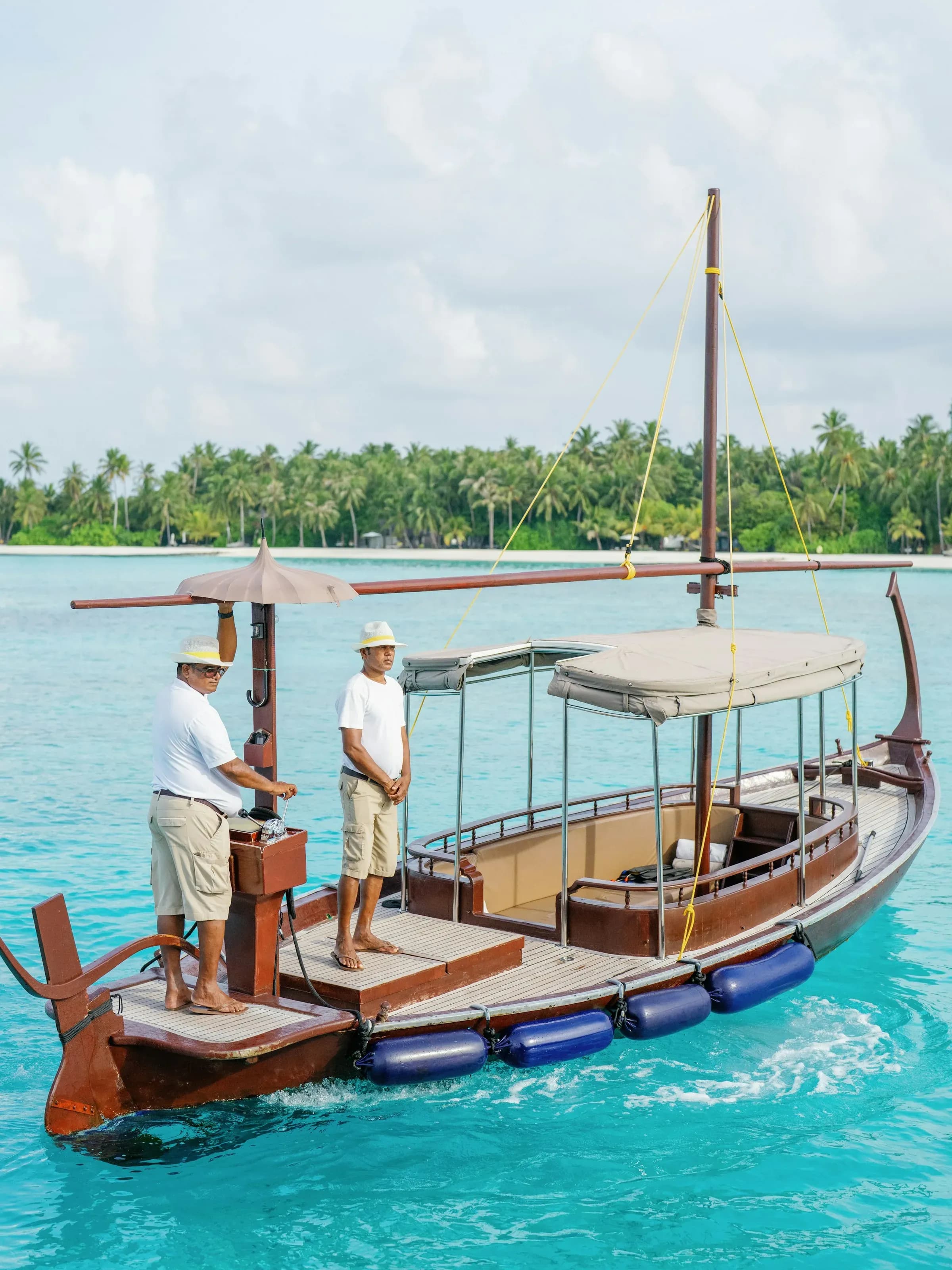 Traditional Maldivian dhoni boat used for excursions from Cheval Blanc Randheli