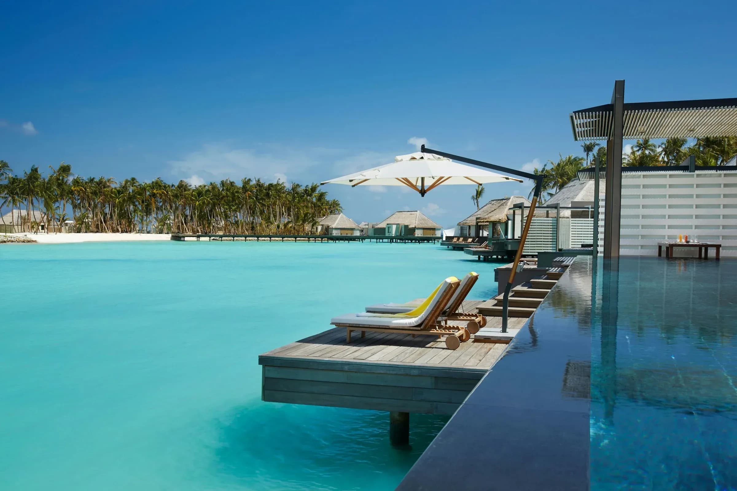 Outdoor deck and infinity pool of the 1-Bedroom Lagoon Villa at Cheval Blanc Randheli