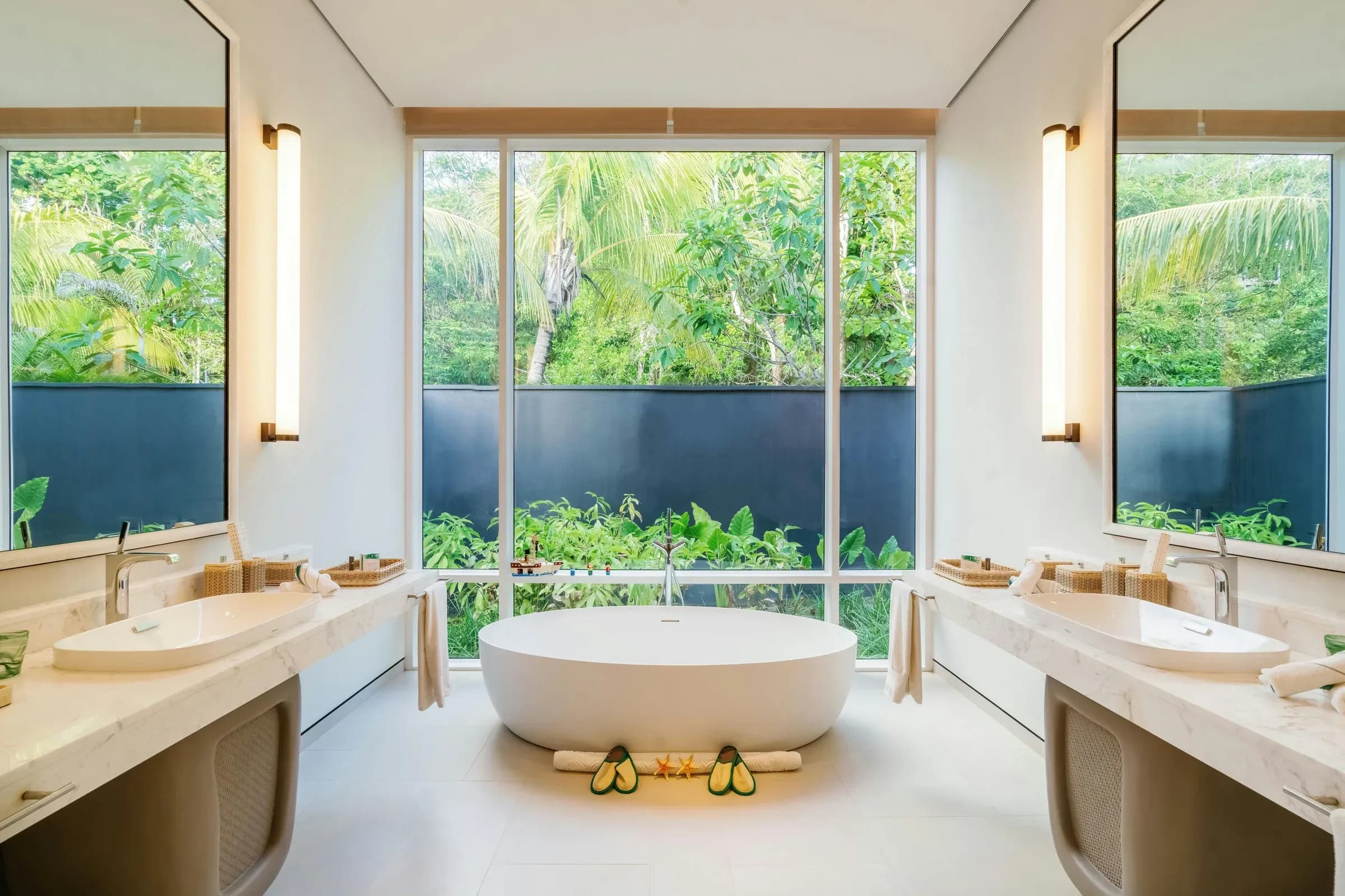 Beach Villa Two-Bedroom living area and garden at Cheval Blanc Seychelles