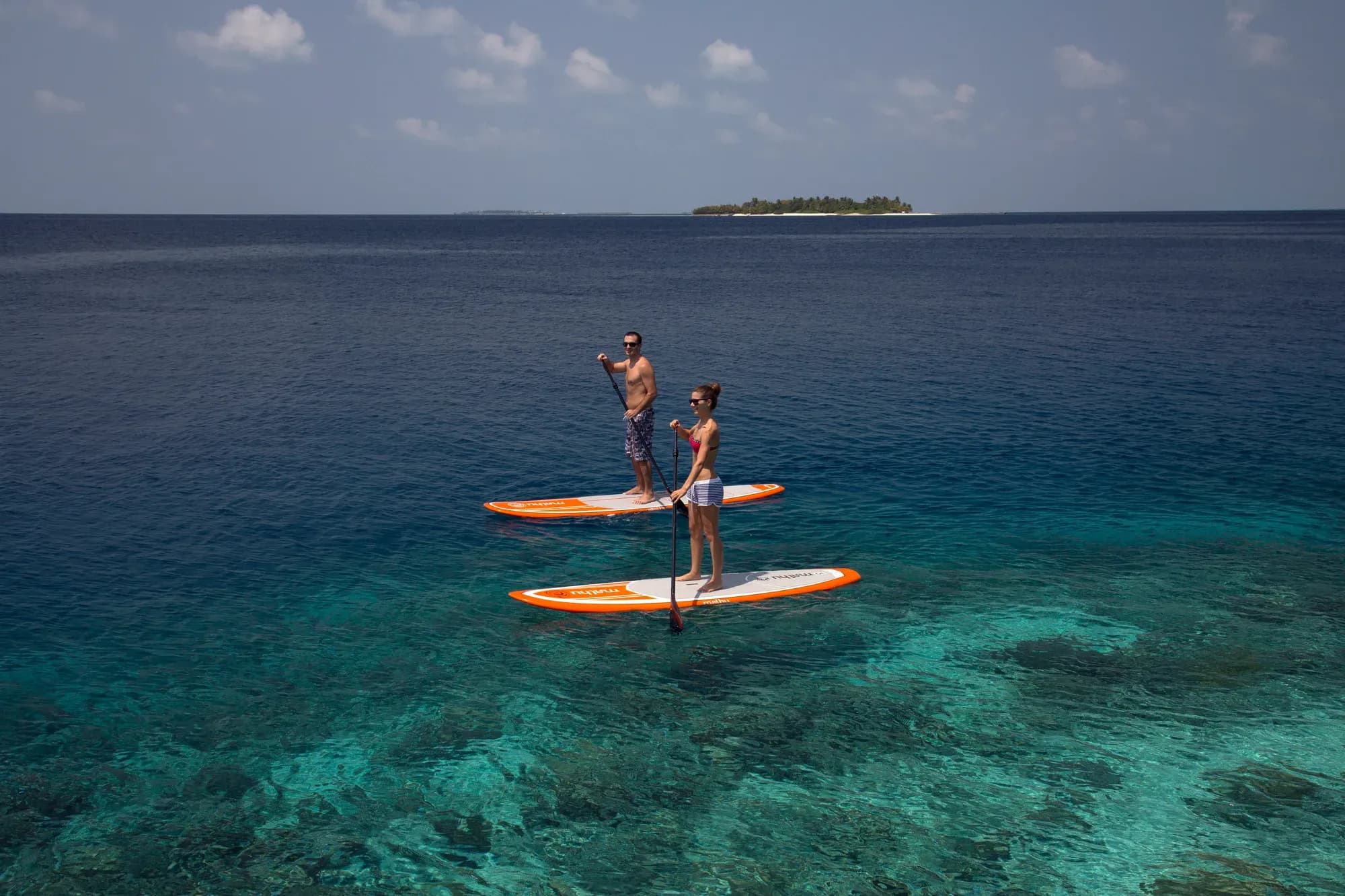 Watersports centre and kayaks on the lagoon at Coco Bodu Hithi