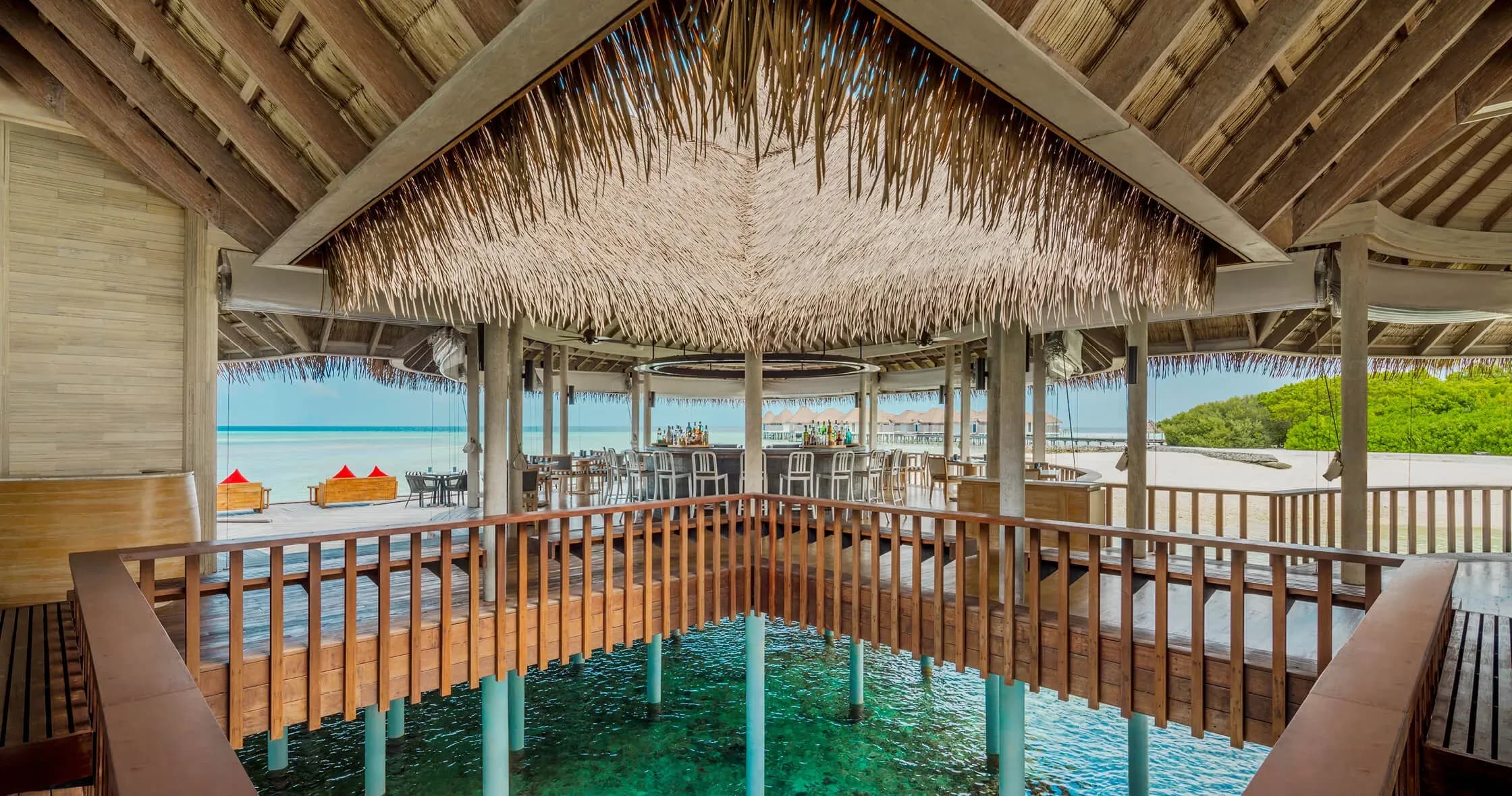 TAI overwater Japanese restaurant deck with bar and ocean view at COMO Maalifushi
