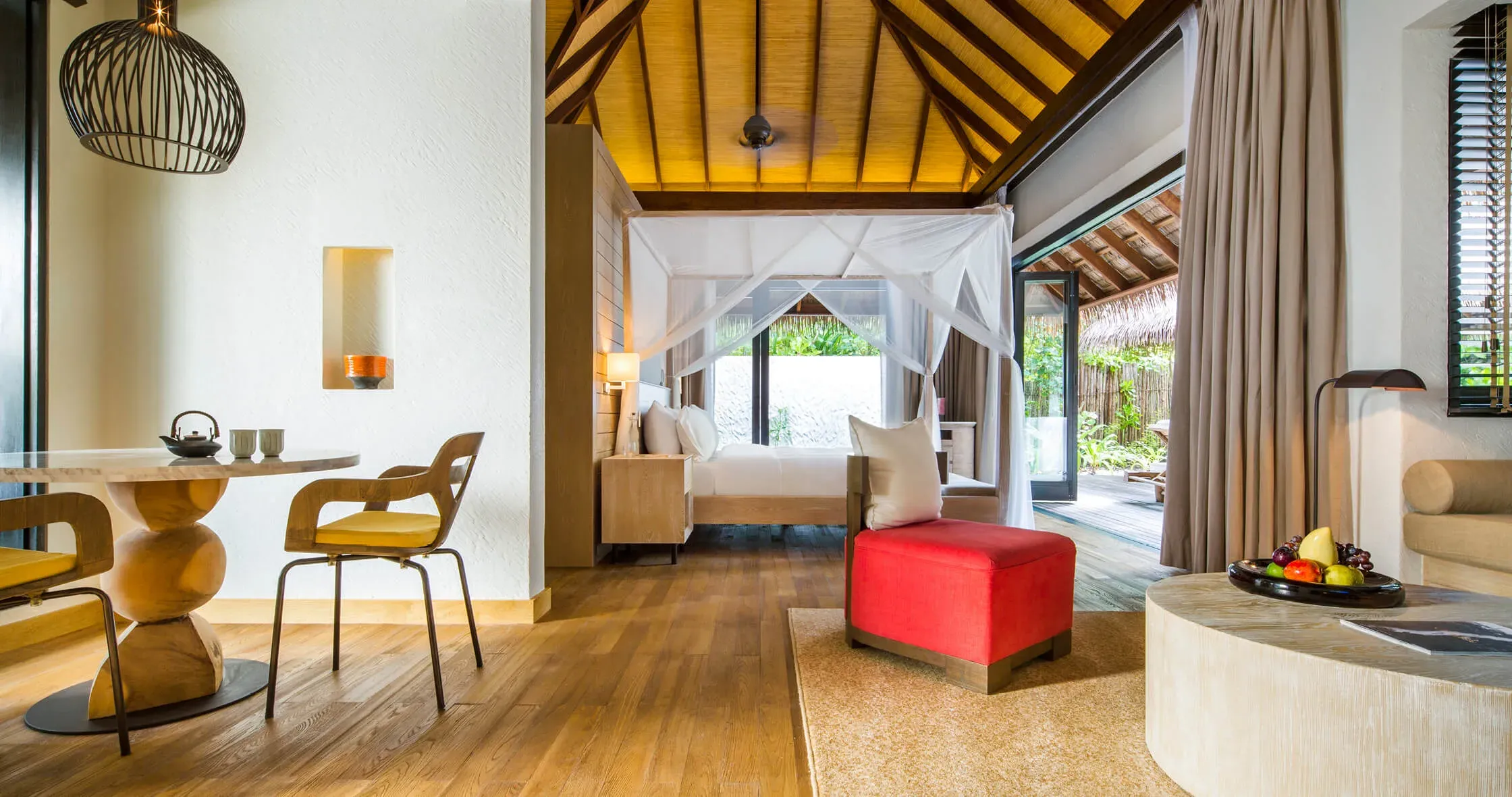 Two-Bedroom Beach Suite living and sleeping area at COMO Maalifushi