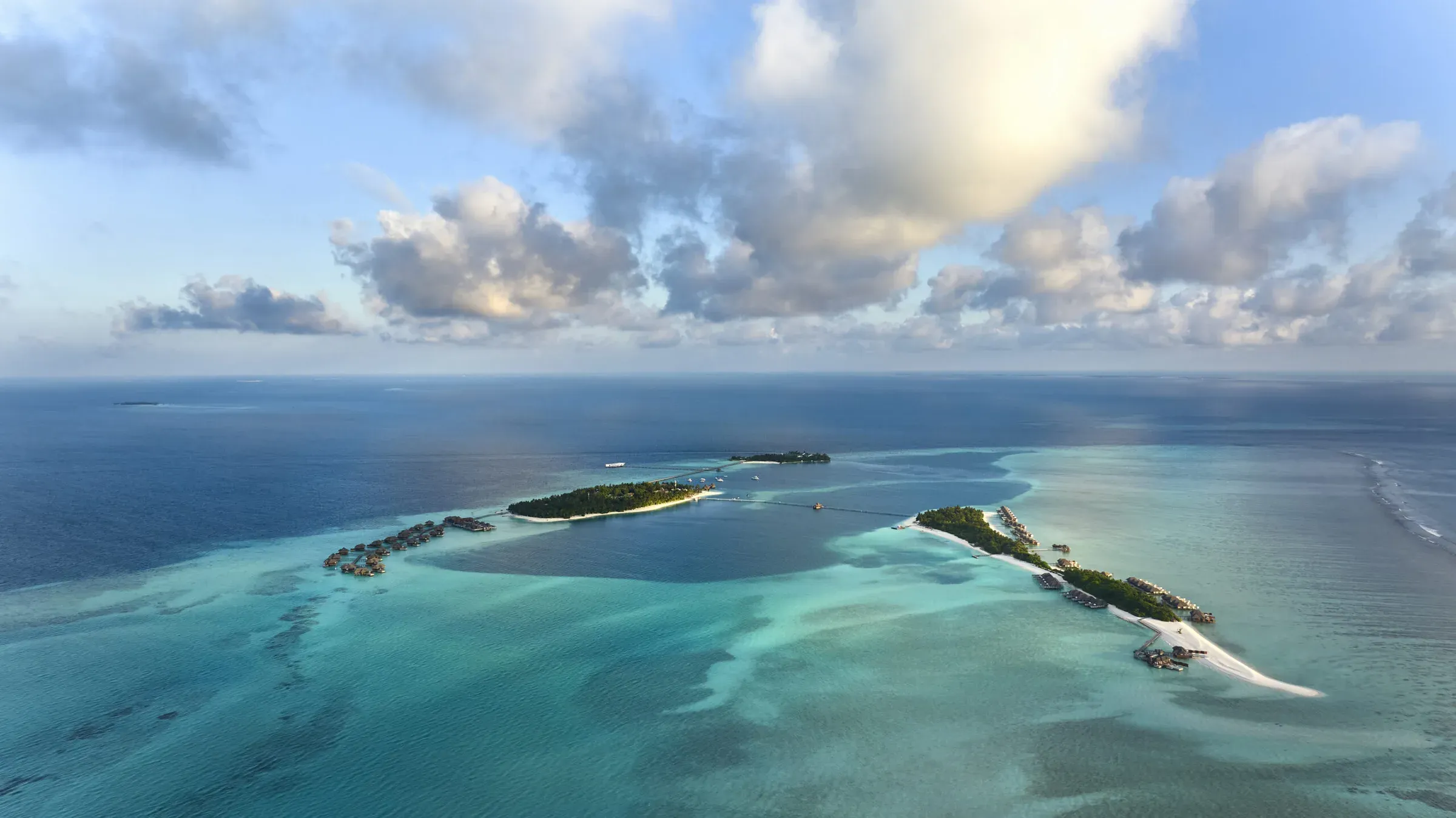 Aerial view of Conrad Maldives Rangali Island's twin islands linked by an overwater bridge, South Ari Atoll