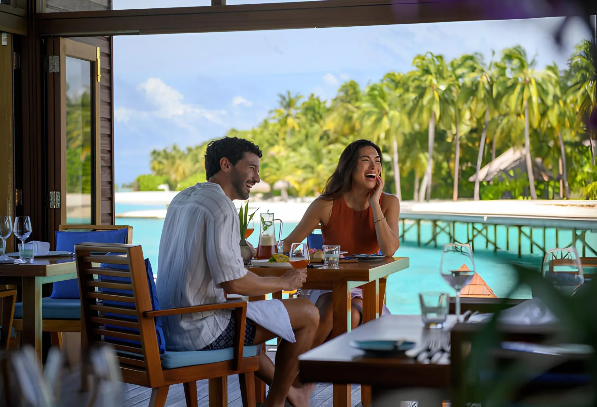 Overwater dining room at Mandhoo Restaurant, Conrad Maldives Rangali Island