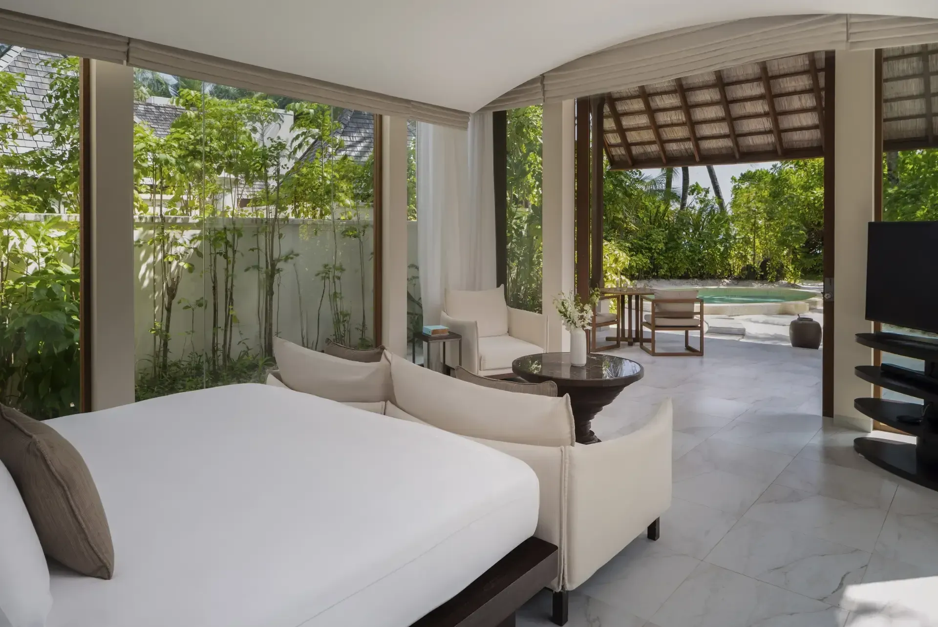 Bedroom of the 2-Bedroom Deluxe Beach Villa with Pool at Conrad Maldives Rangali Island