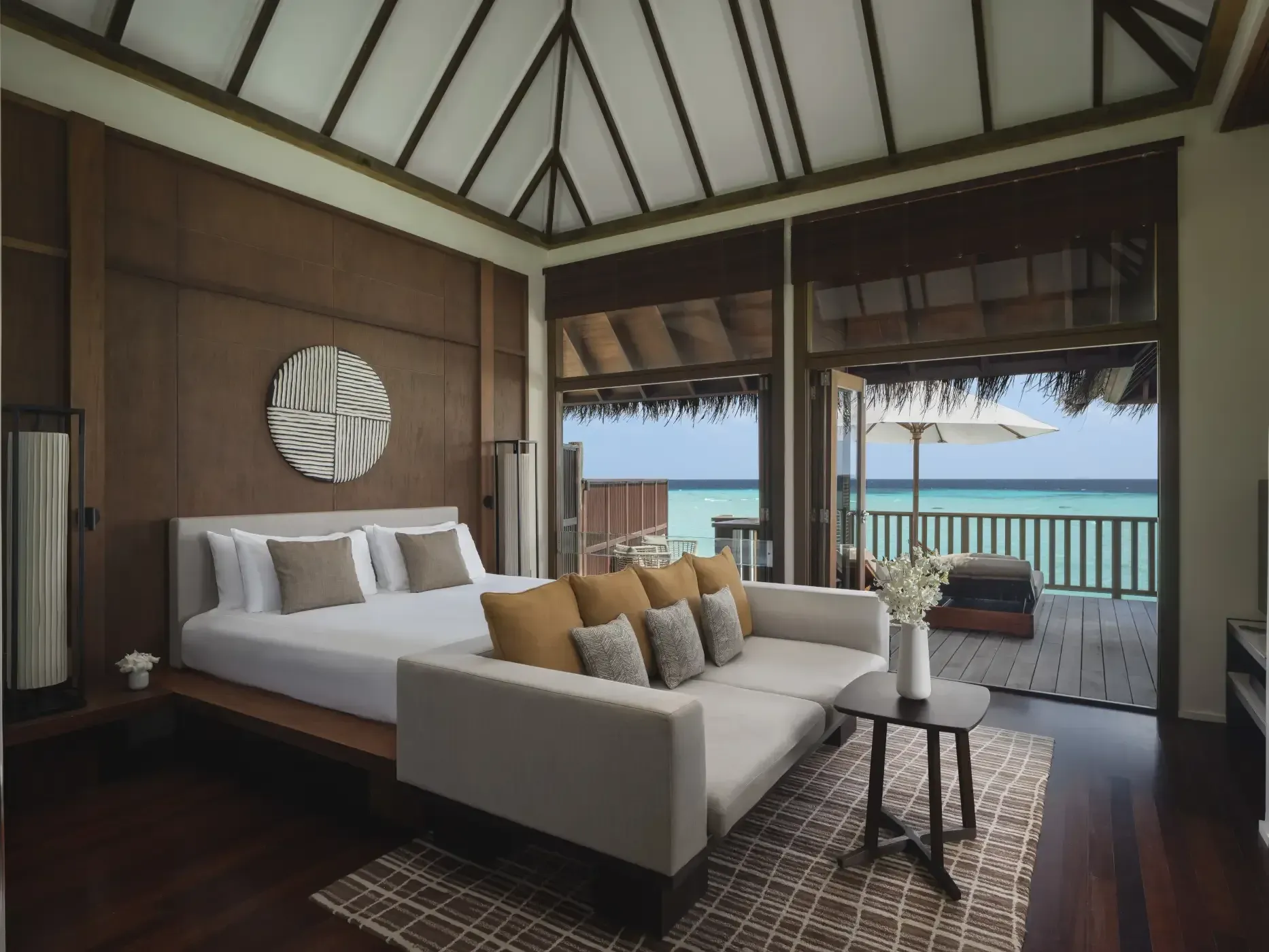 Main bedroom of the 2-Bedroom Grand Water Villa at Conrad Maldives Rangali Island