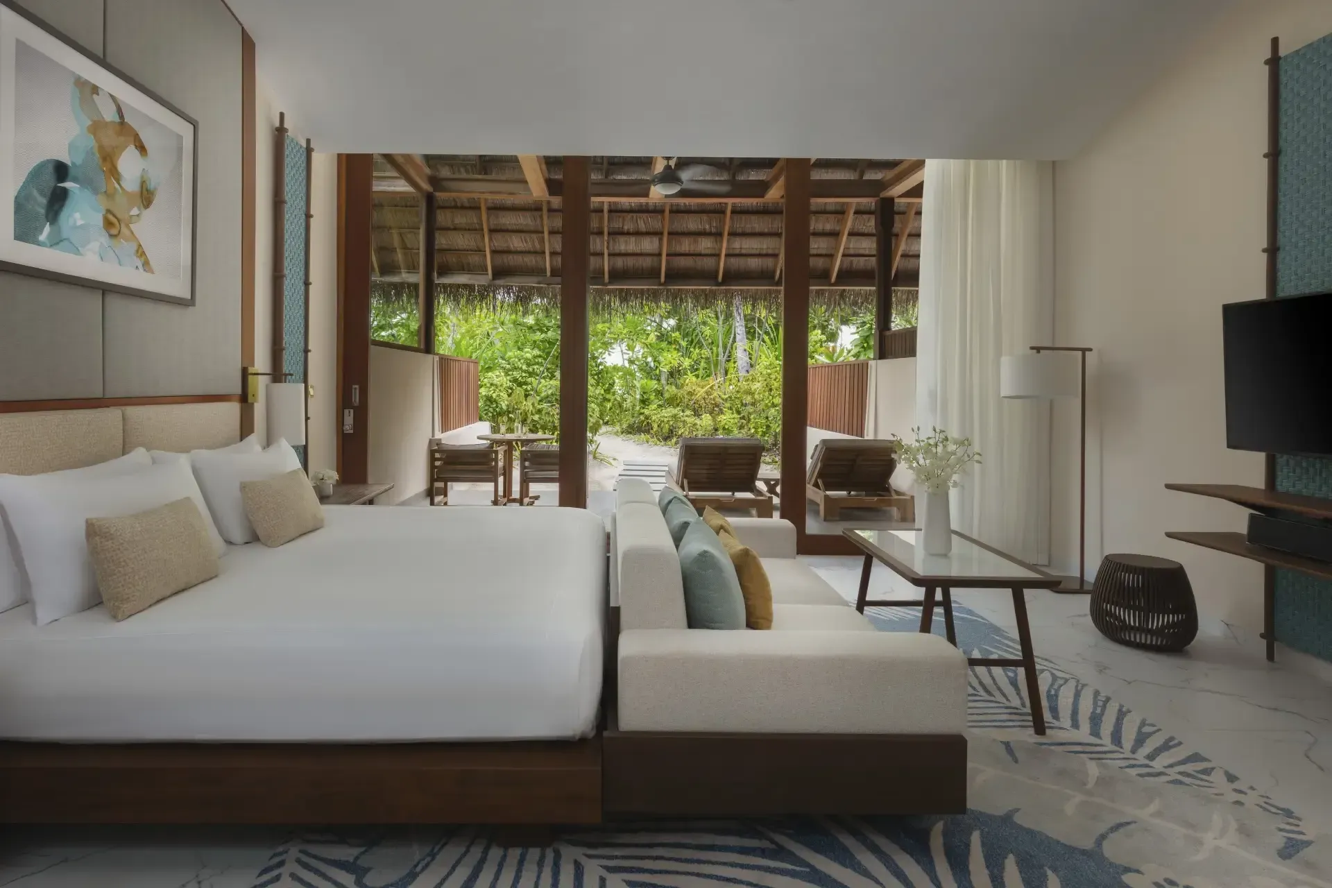 Bedroom interior of a Beach Villa at Conrad Maldives Rangali Island