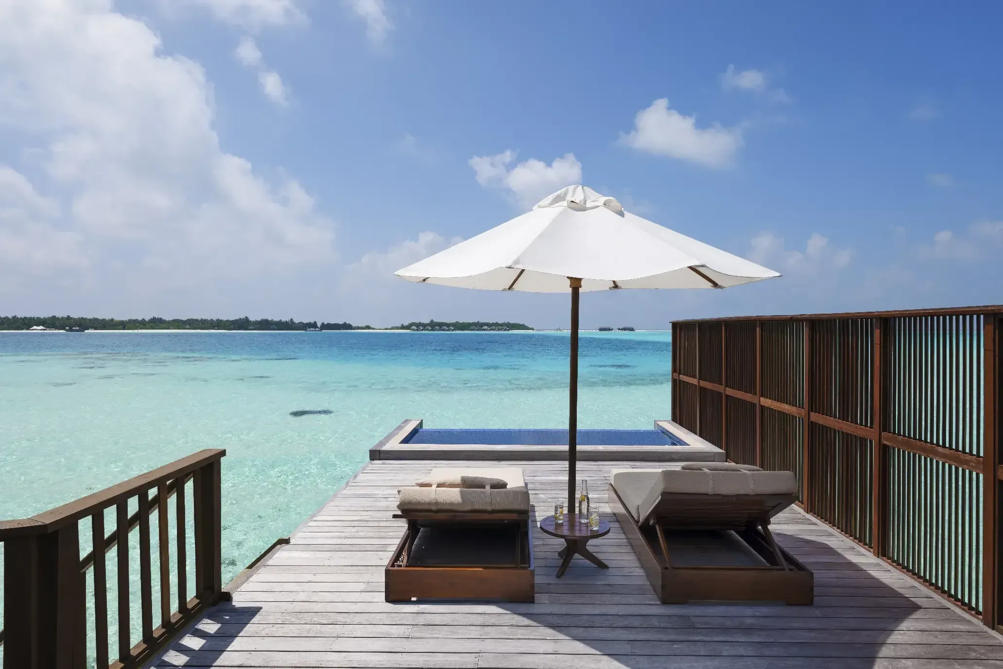 Overwater deck and private pool of the Grand Water Villa with Pool at Conrad Maldives Rangali Island