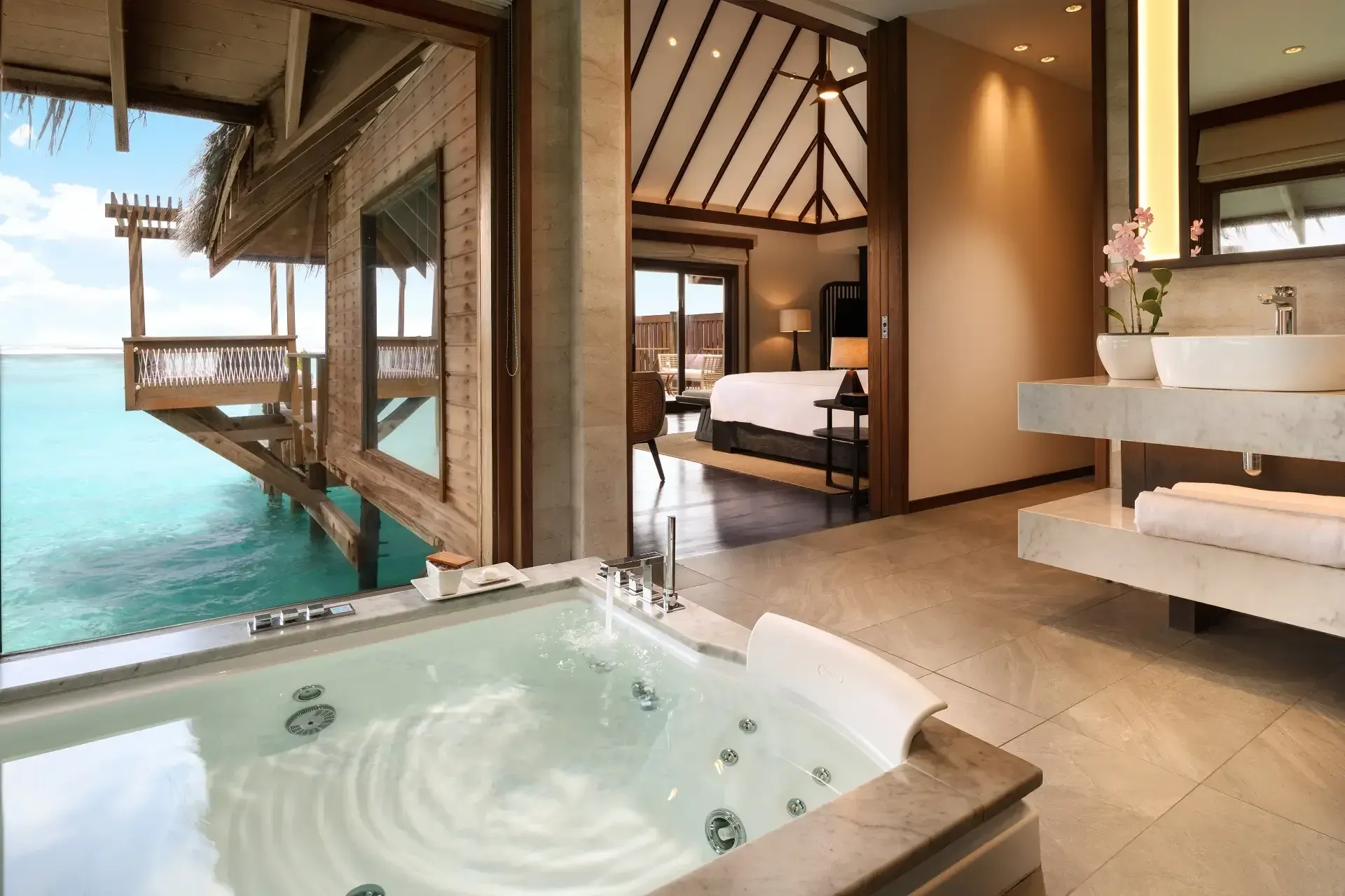 Ocean-view bathtub in the Premier Water Villa with Pool at Conrad Maldives Rangali Island