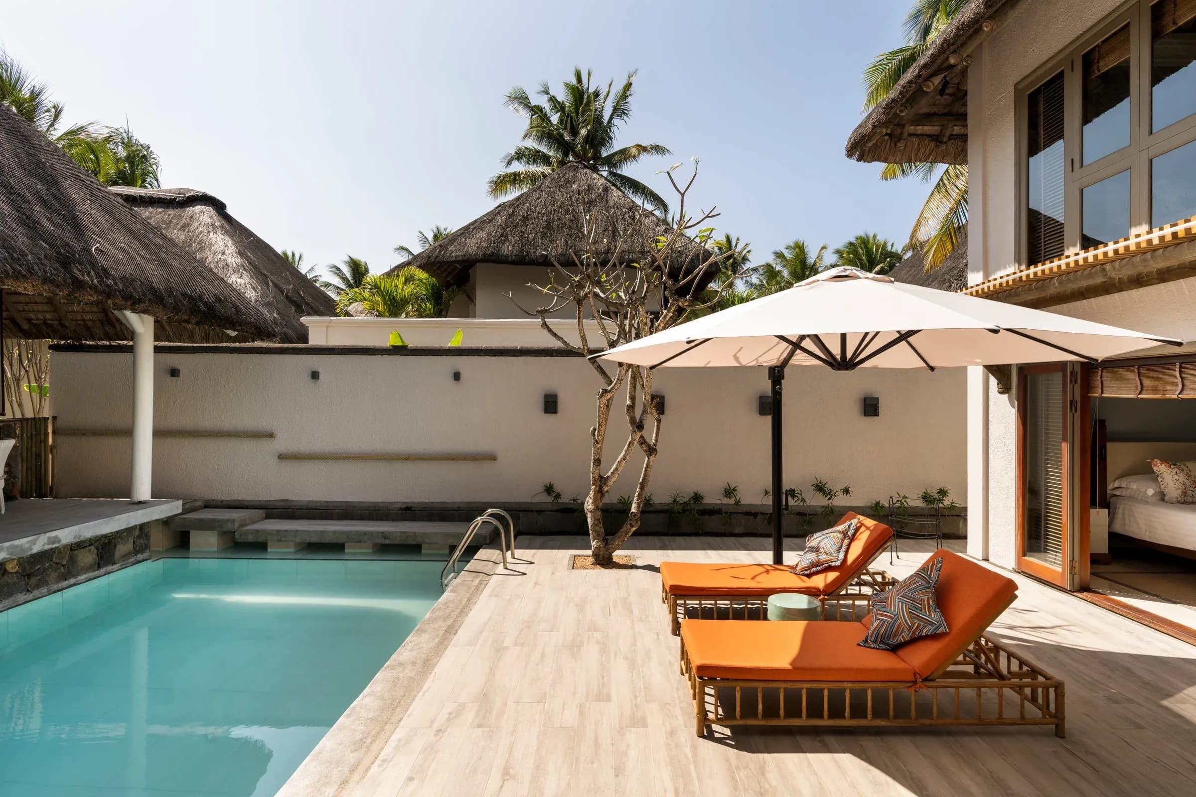Two-Bedroom Pool Villa terrace with private heated pool at Constance Belle Mare Plage