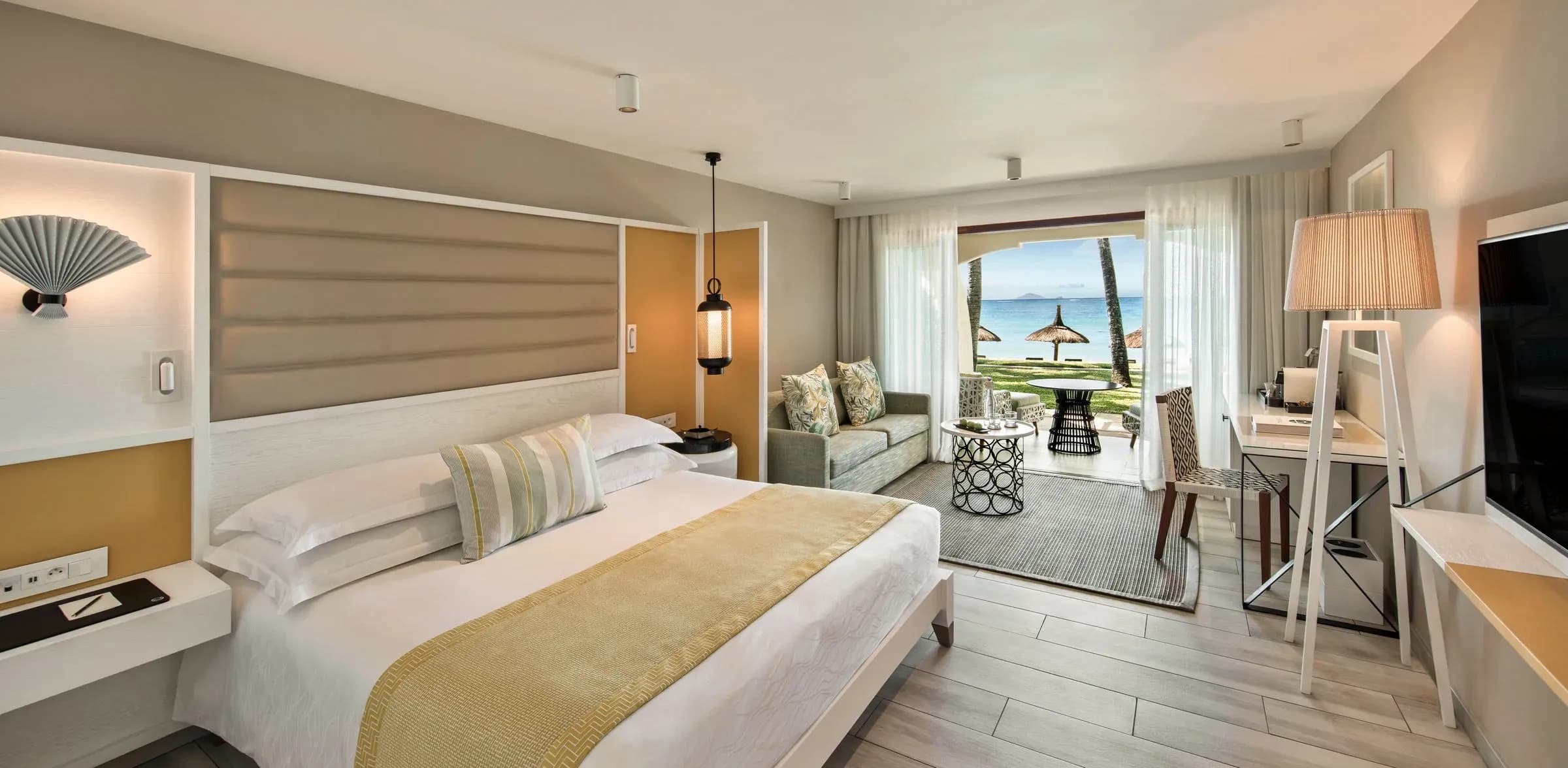 Prestige Room interior with sea-facing balcony at Constance Belle Mare Plage