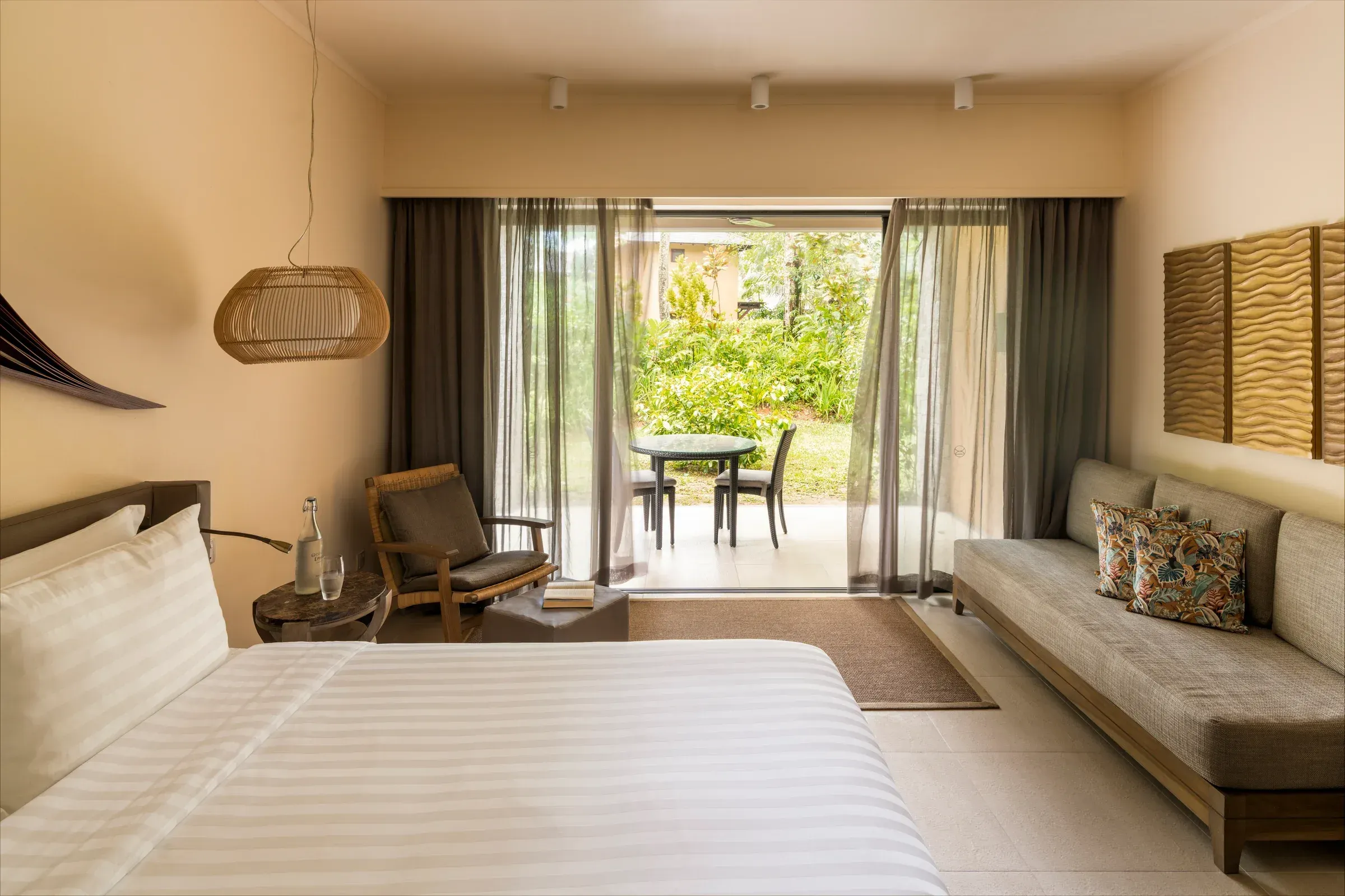 Tropical Garden View Room interior at Constance Ephelia