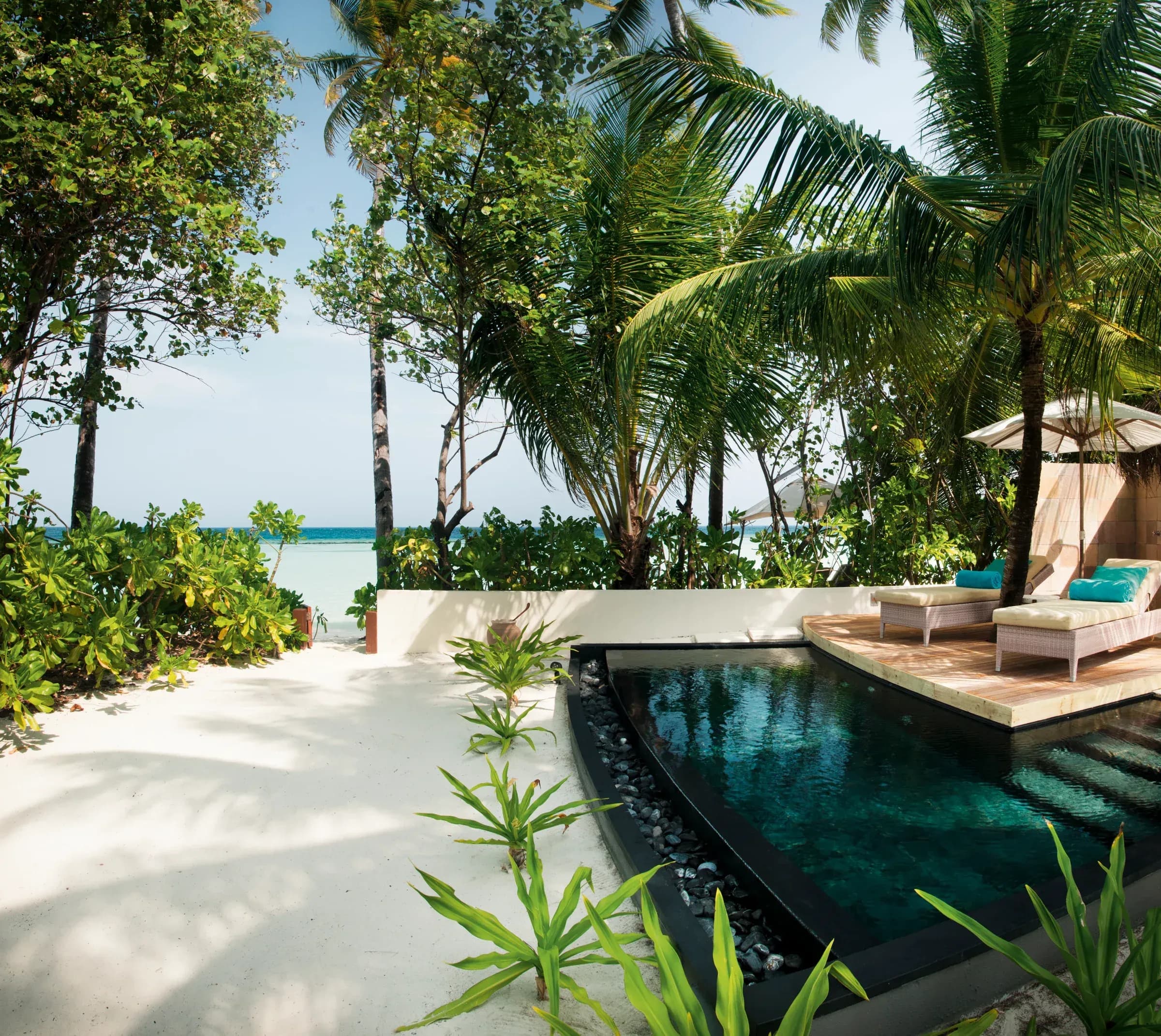 Family Beach Villa garden and pool at Constance Halaveli