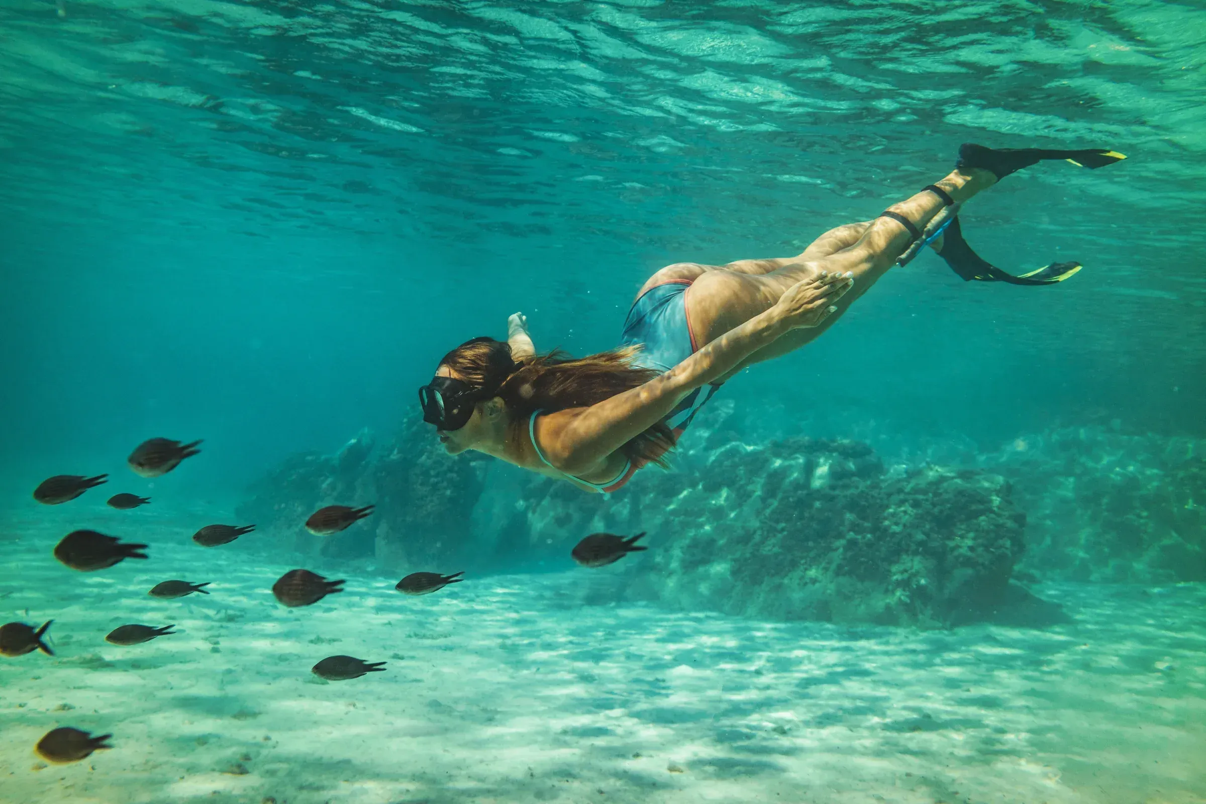Snorkelling in the protected waters of Blue Bay Marine Park near Constance Le Chaland