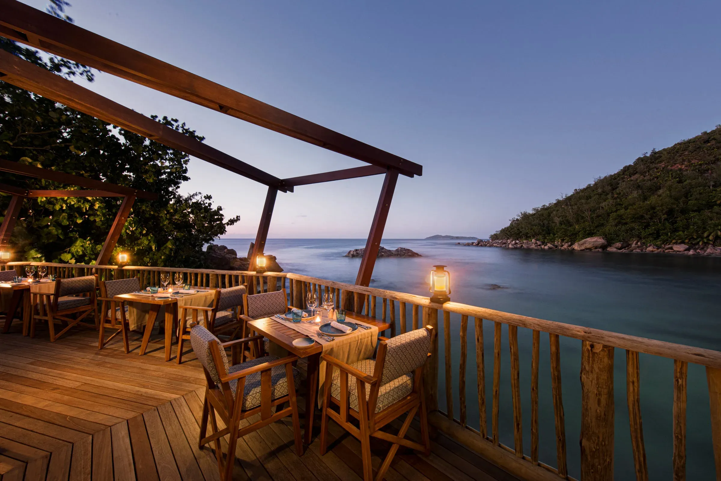 The Nest restaurant set on the rock peninsula between the two Anse Kerlan beaches