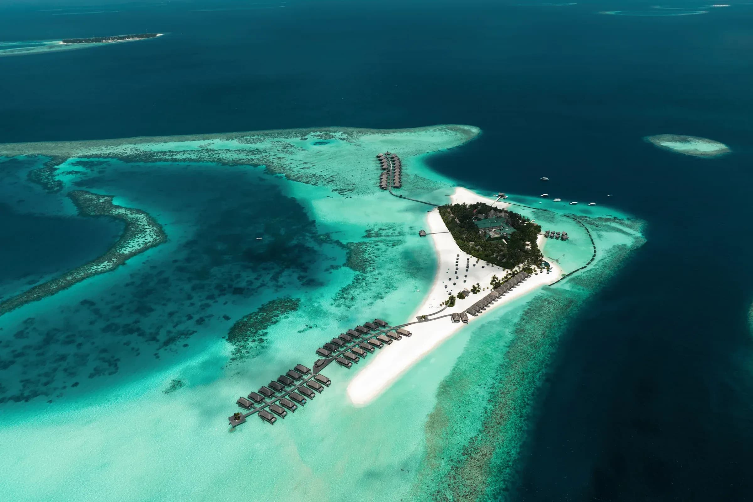 Aerial view of Constance Moofushi's island, jetty and lagoon in the South Ari Atoll