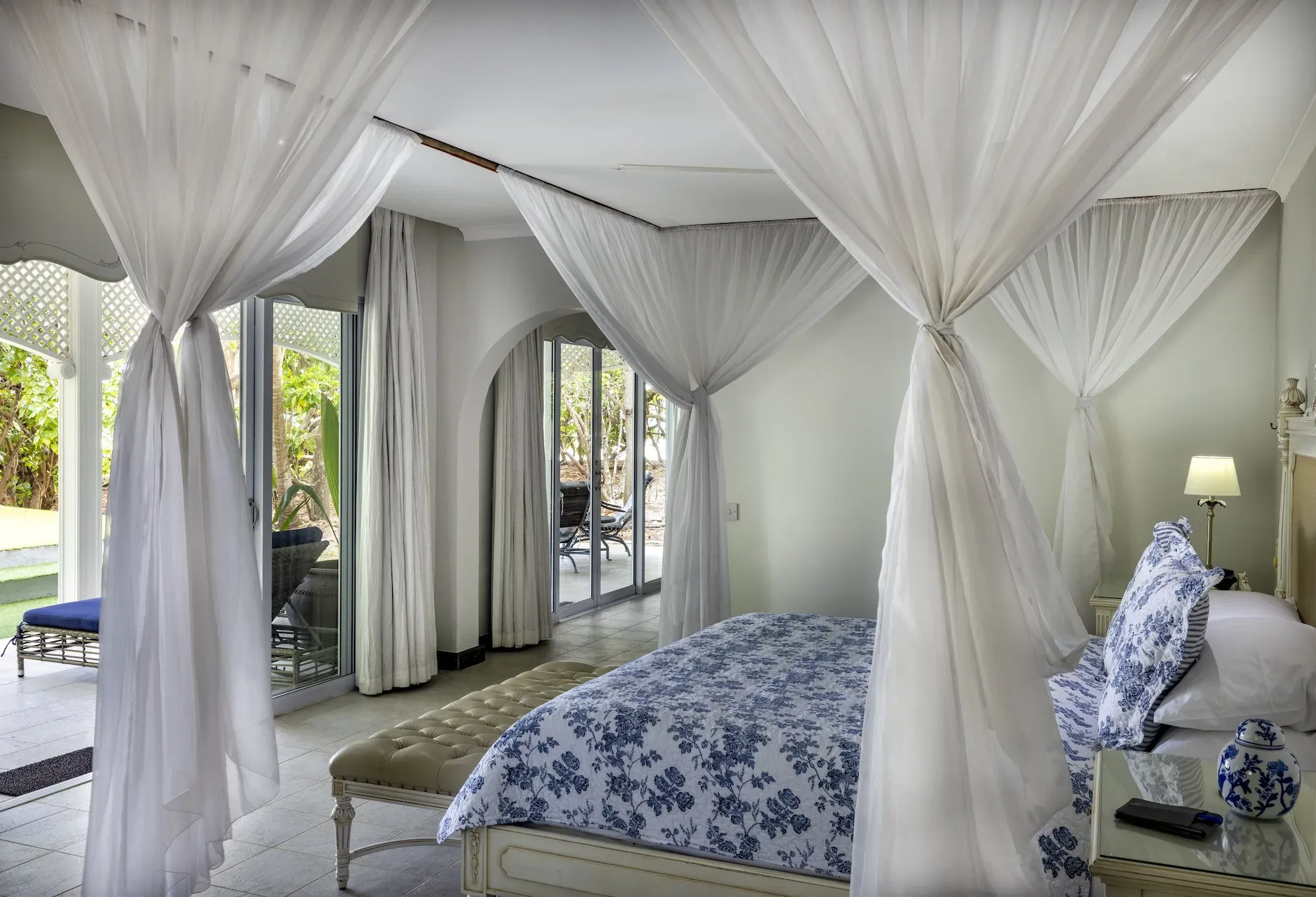 Four-poster bed interior of a Luxury Beach Villa at Cousine Island