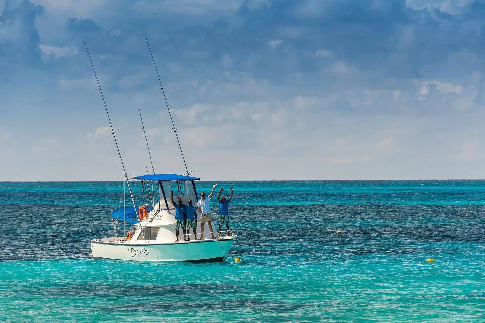 Denis Private Island's game-fishing boat and crew returning from The Drop-Off