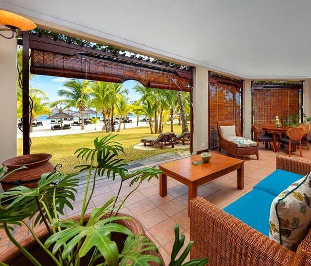 Senior Zen Suite Beachfront bedroom with garden views in the adults-only area at Dinarobin Beachcomber