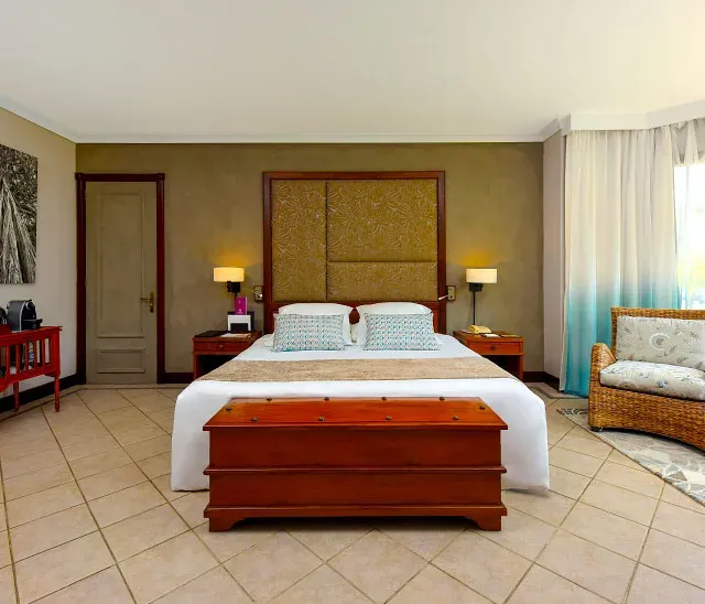 Zen Suite Beachfront lounge terrace overlooking the garden at Dinarobin Beachcomber's adults-only area