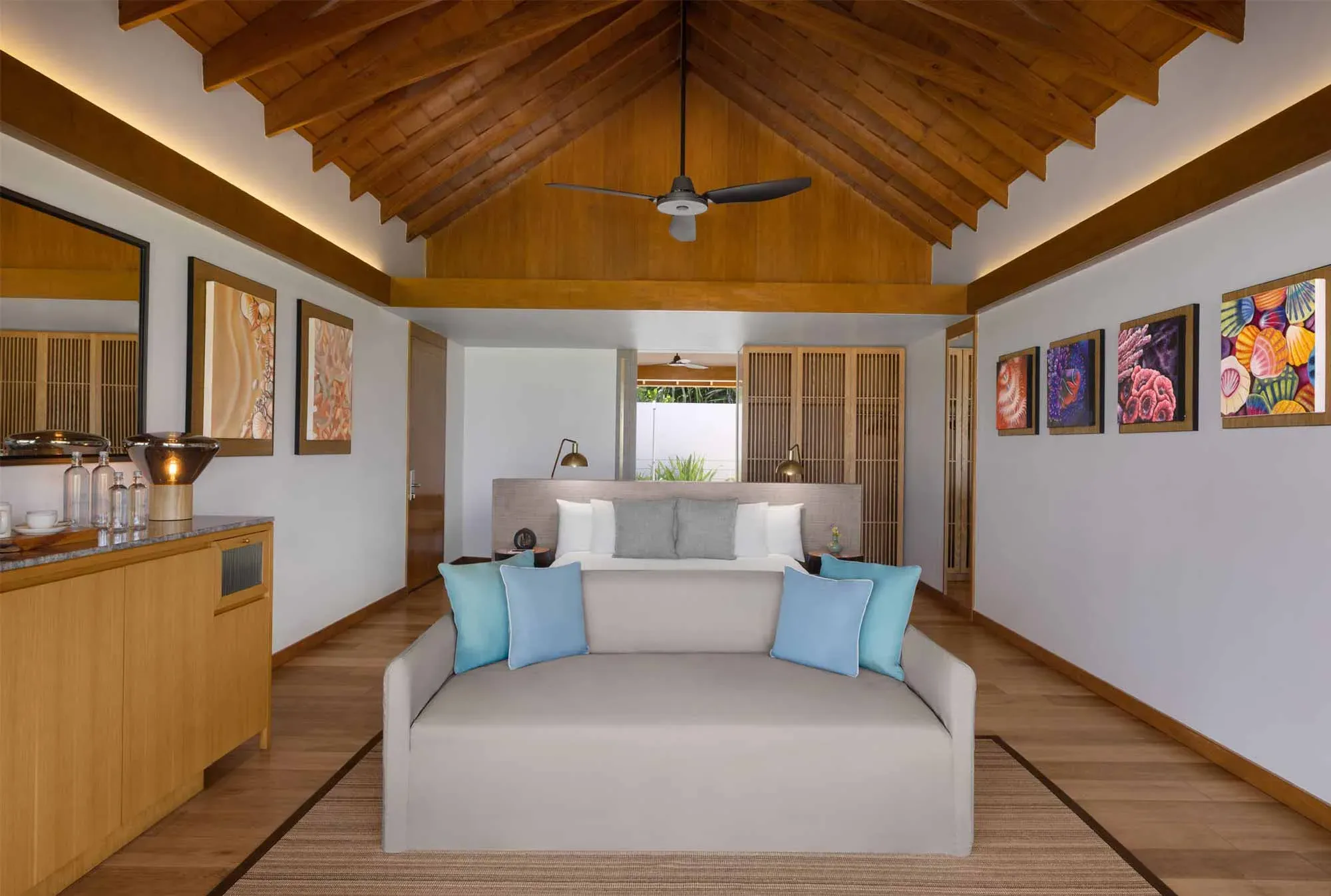 Beach Villa interior with garden view at Emerald Faarufushi Resort & Spa