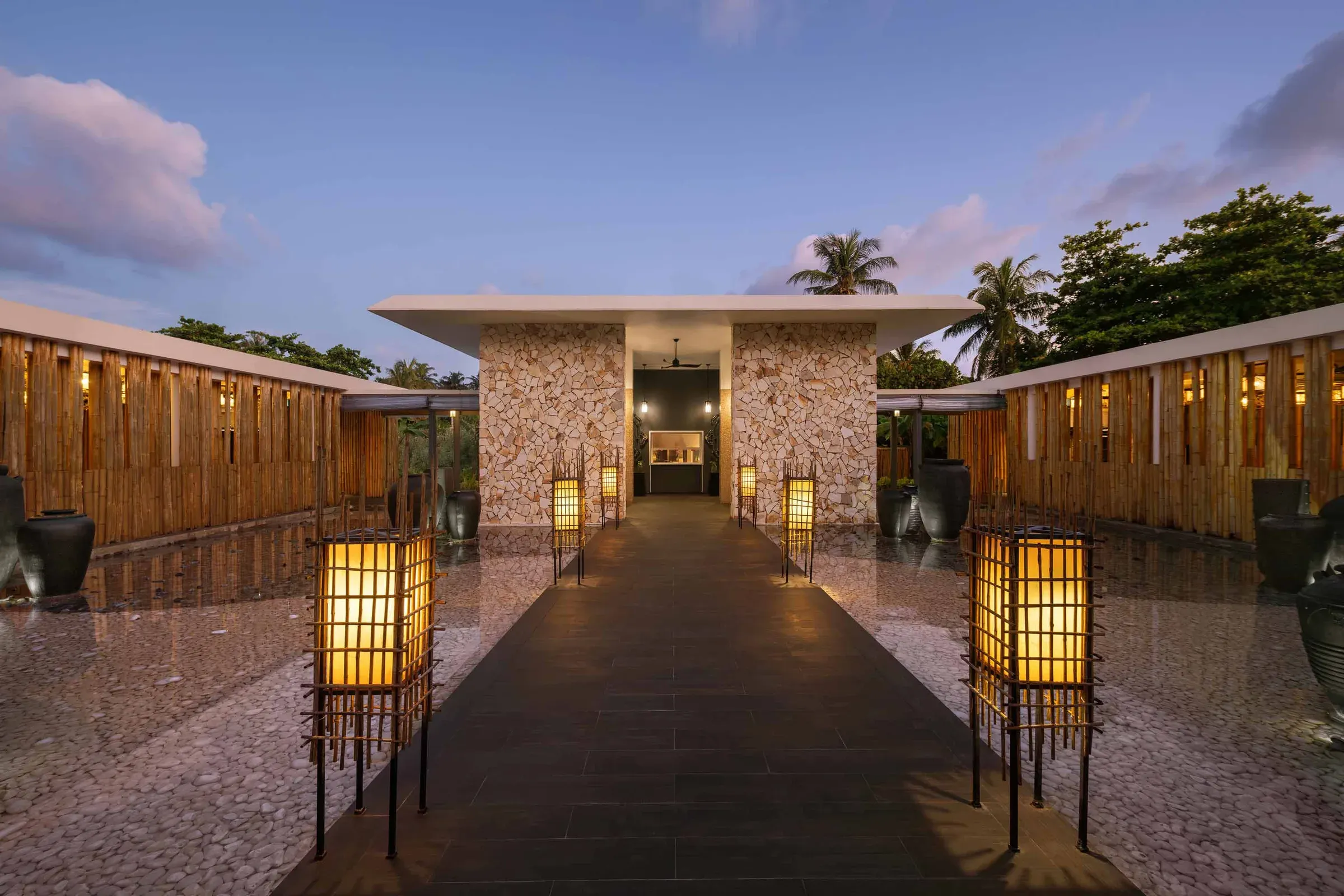 Le Asiatique Restaurant dining room set in the tropical forest at Emerald Maldives Resort & Spa