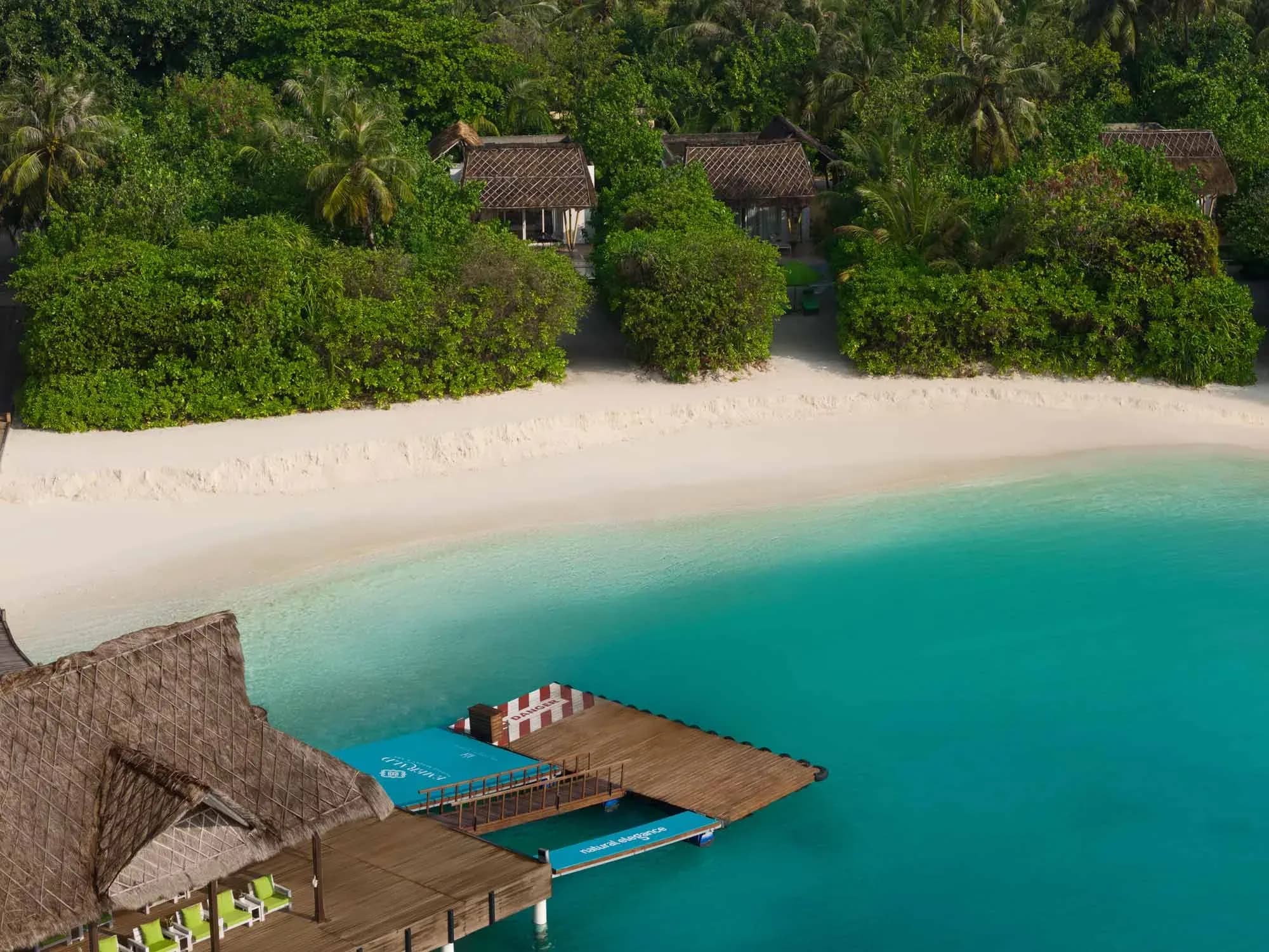 Aerial view of a Marina Garden Villa with Pool near the resort marina at Emerald Maldives Resort & Spa