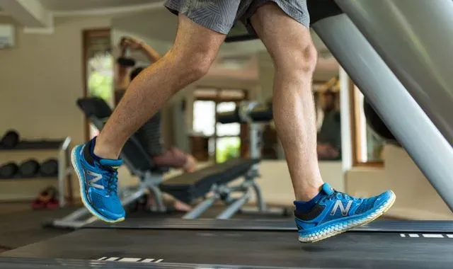 Guest running on a treadmill in the Fitness Centre at Essque Zalu Zanzibar