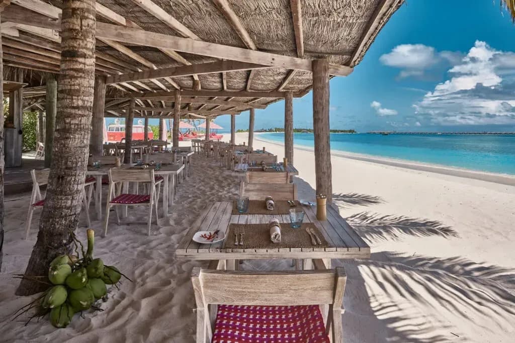 Crab Shack beachfront dining tables on the sandbank at Finolhu Maldives